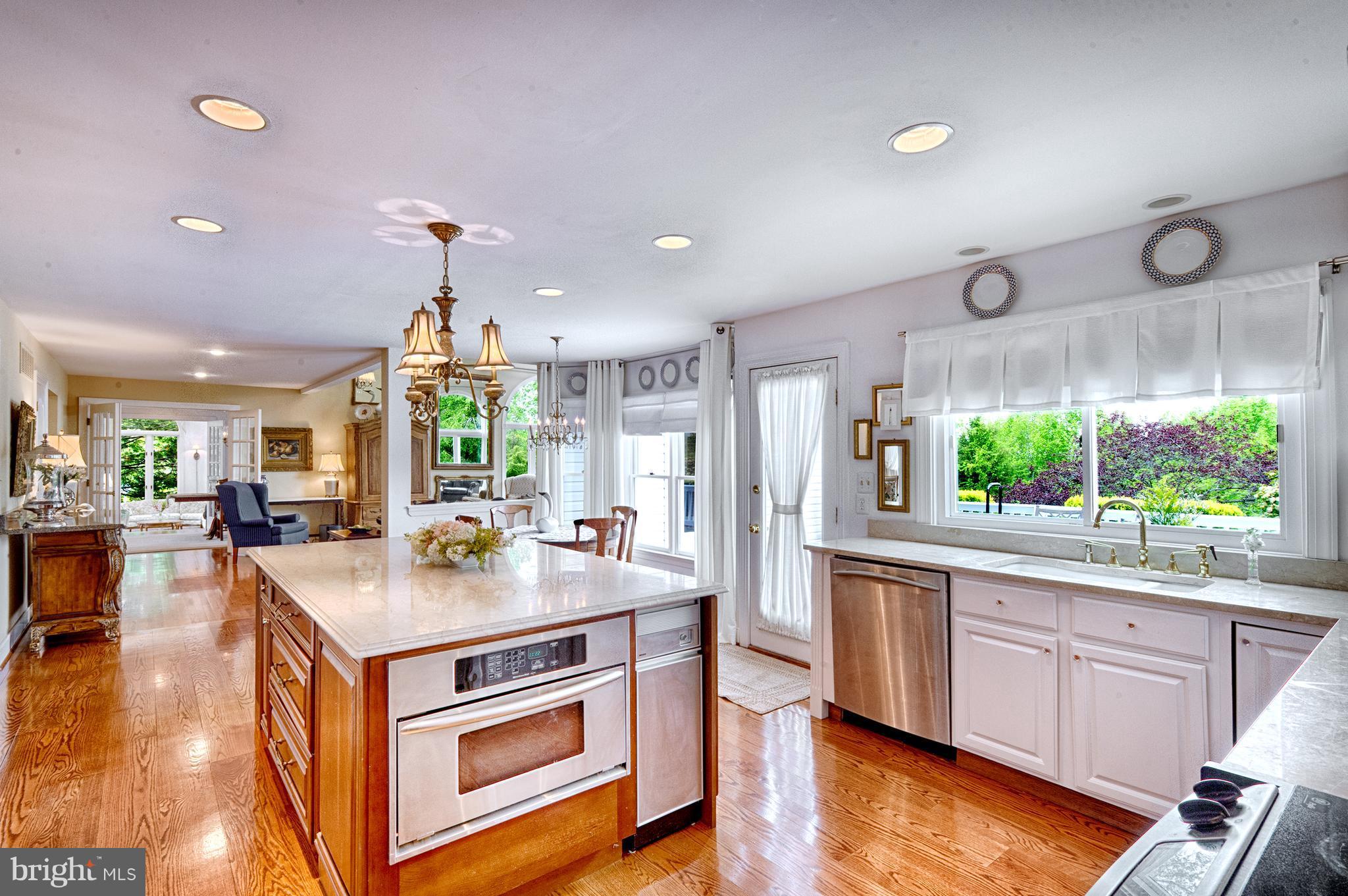 2090 Chapel Road Havre de Grace, MD 21078 - Photo 10 of 29 a kitchen with a stove a sink and a refrigerator