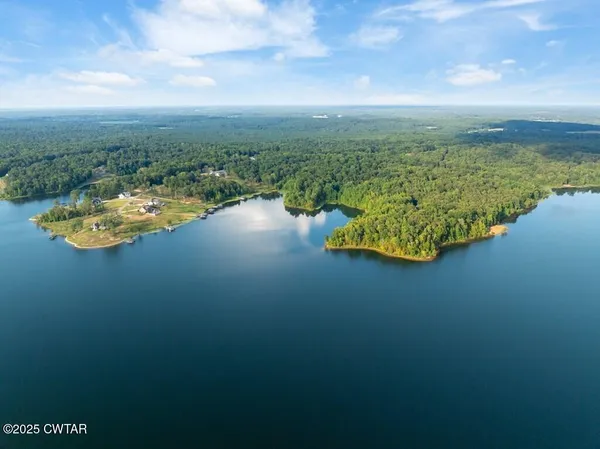 a view of a lake from a yard