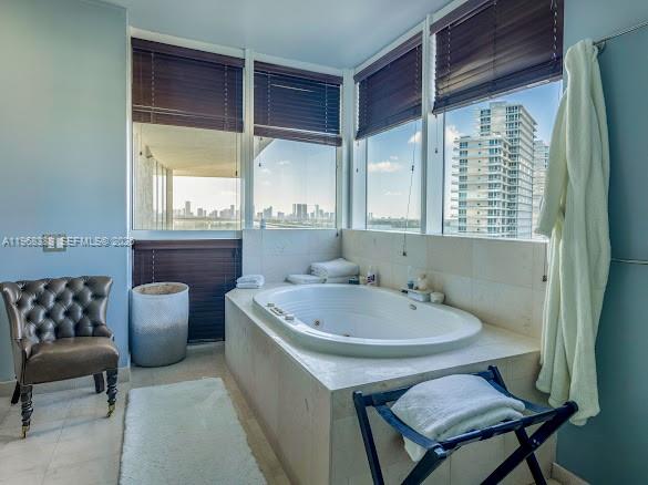 450 Alton Road, Unit 1202 Miami Beach, FL 33139 - Photo 20 of 68 a bathroom with a sink and a mirror