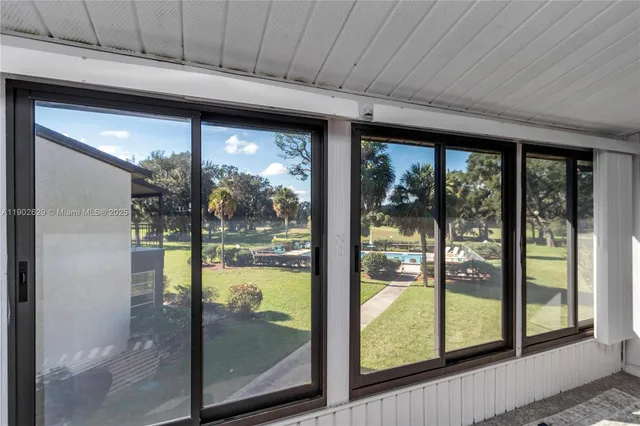 a bathroom with a large window