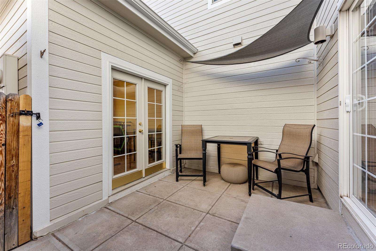 8300 Fairmount Drive, Unit 103 Denver, CO 80247 - Photo 25 of 34 a view of an outdoor space with seating area