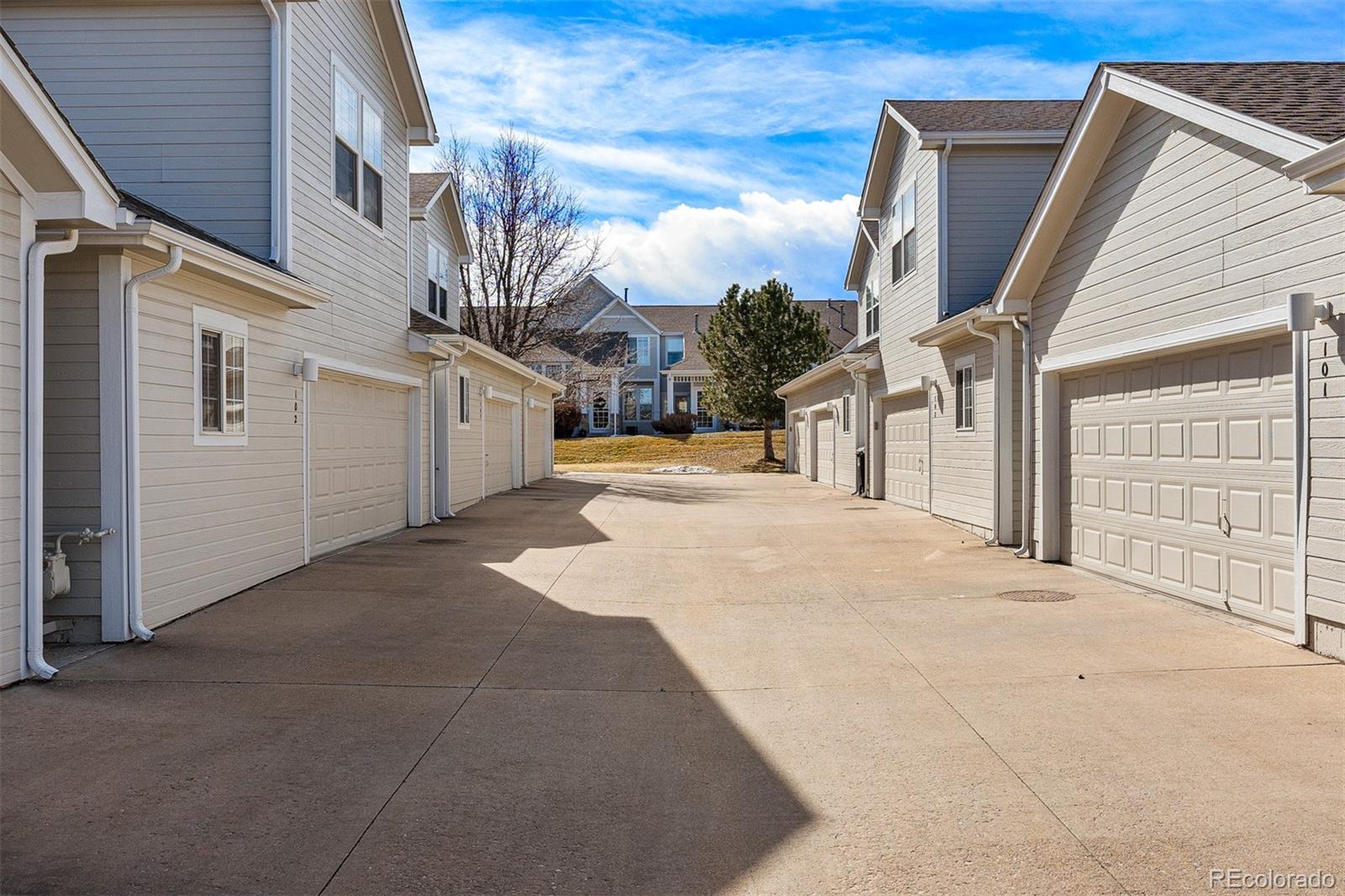 8300 Fairmount Drive, Unit 103 Denver, CO 80247 - Photo 32 of 34 a view of a house with a outdoor space