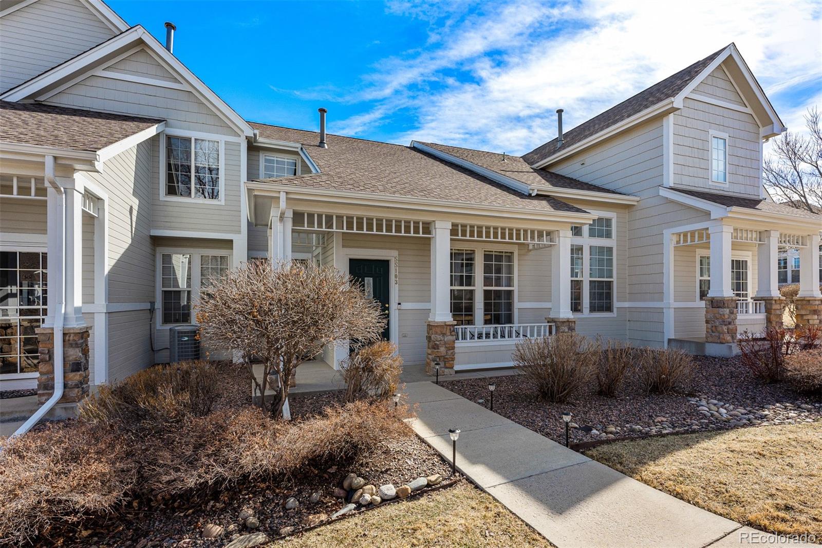 8300 Fairmount Drive, Unit 103 Denver, CO 80247 - Photo 34 of 34 a house view with a outdoor space