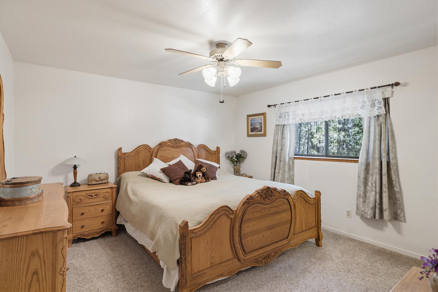 4838 Golden Street Pollock Pines, CA 95726 - Photo 12 of 35 a bedroom with a bed and a window