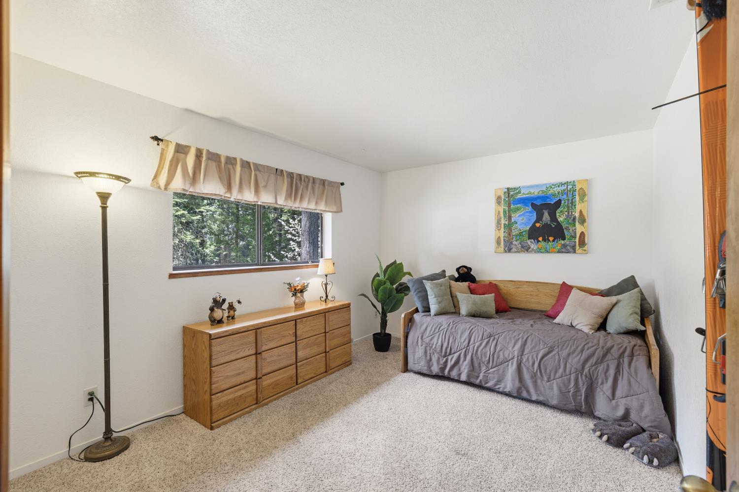 4838 Golden Street Pollock Pines, CA 95726 - Photo 18 of 35 a living room with furniture and a flat screen tv