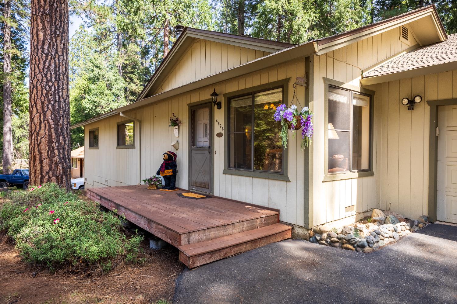 4838 Golden Street Pollock Pines, CA 95726 - Photo 2 of 35 a front view of a house with a porch