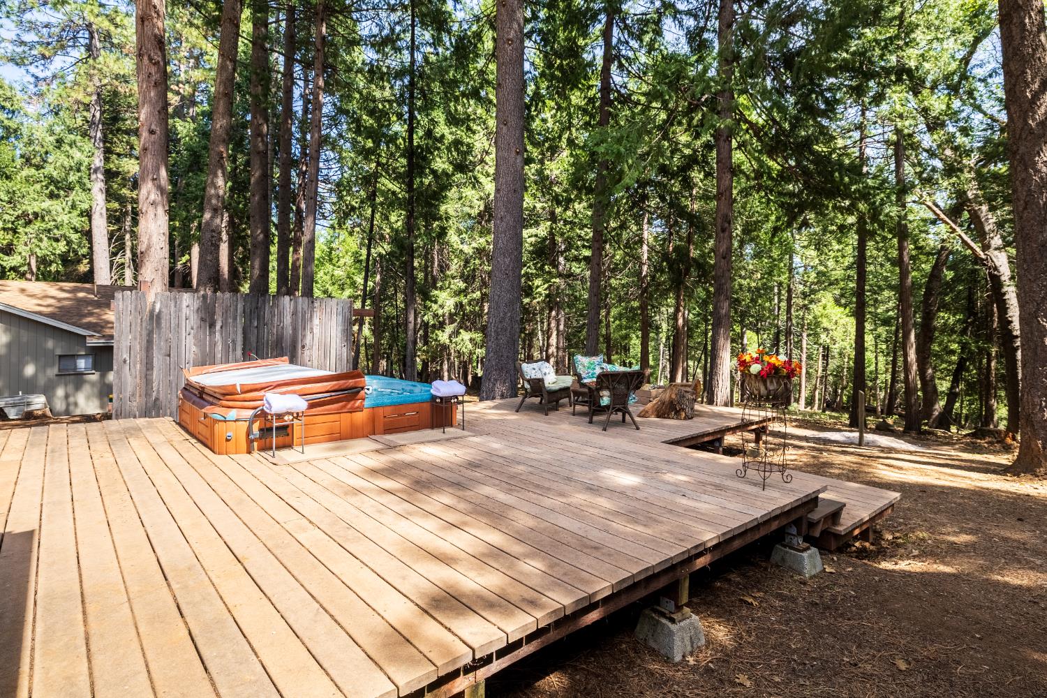 4838 Golden Street Pollock Pines, CA 95726 - Photo 21 of 35 a wooden bench sitting on top of a wooden floor