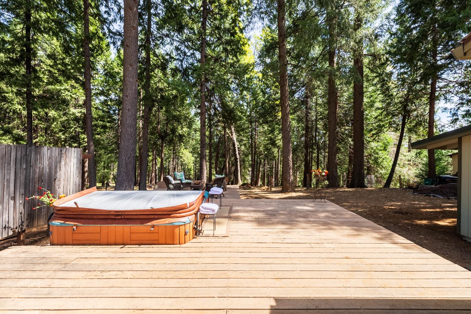 4838 Golden Street Pollock Pines, CA 95726 - Photo 22 of 35 a wooden bench sitting on top of a wooden floor