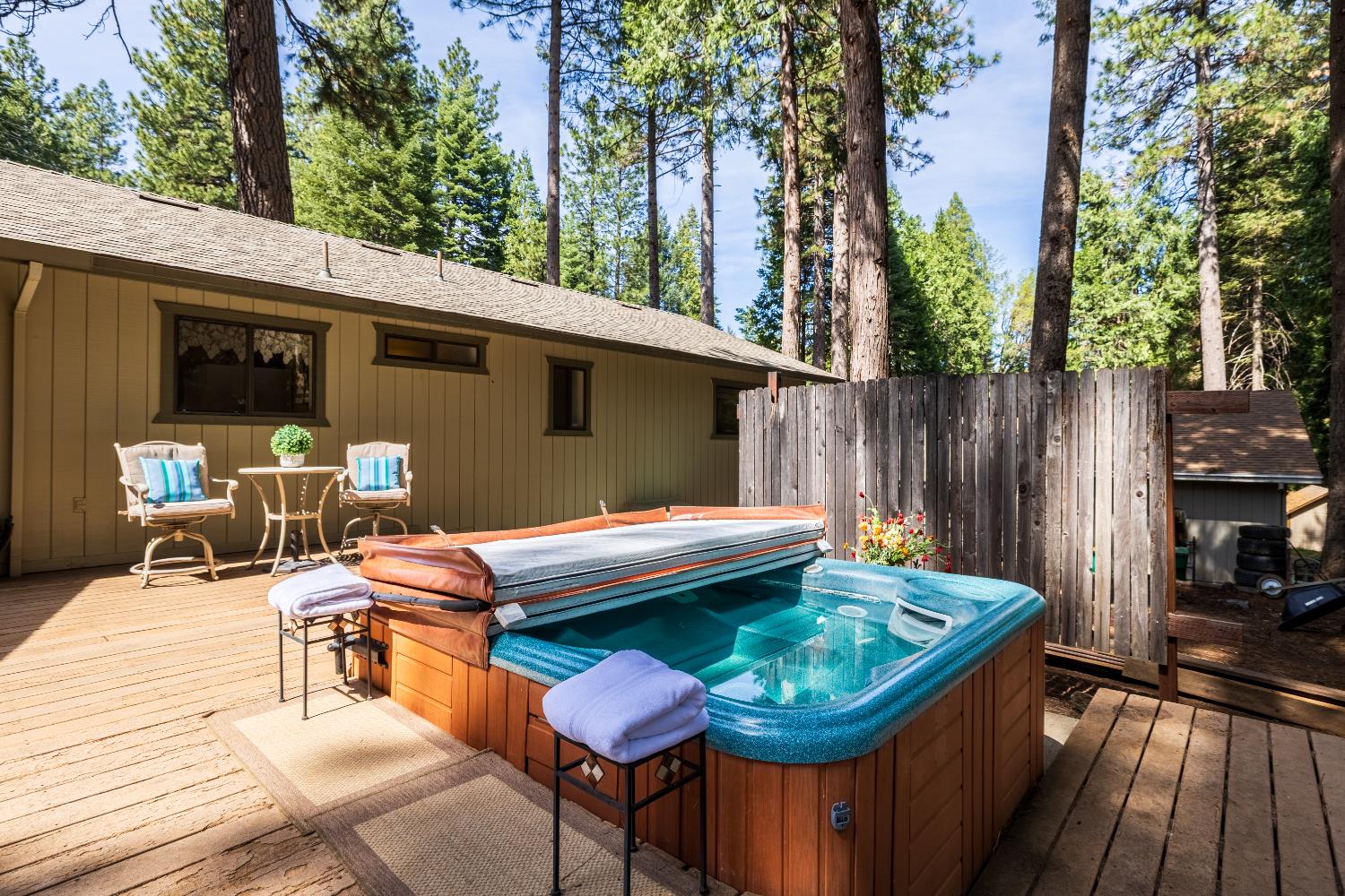 4838 Golden Street Pollock Pines, CA 95726 - Photo 23 of 35 a backyard of a house with barbeque oven table and chairs