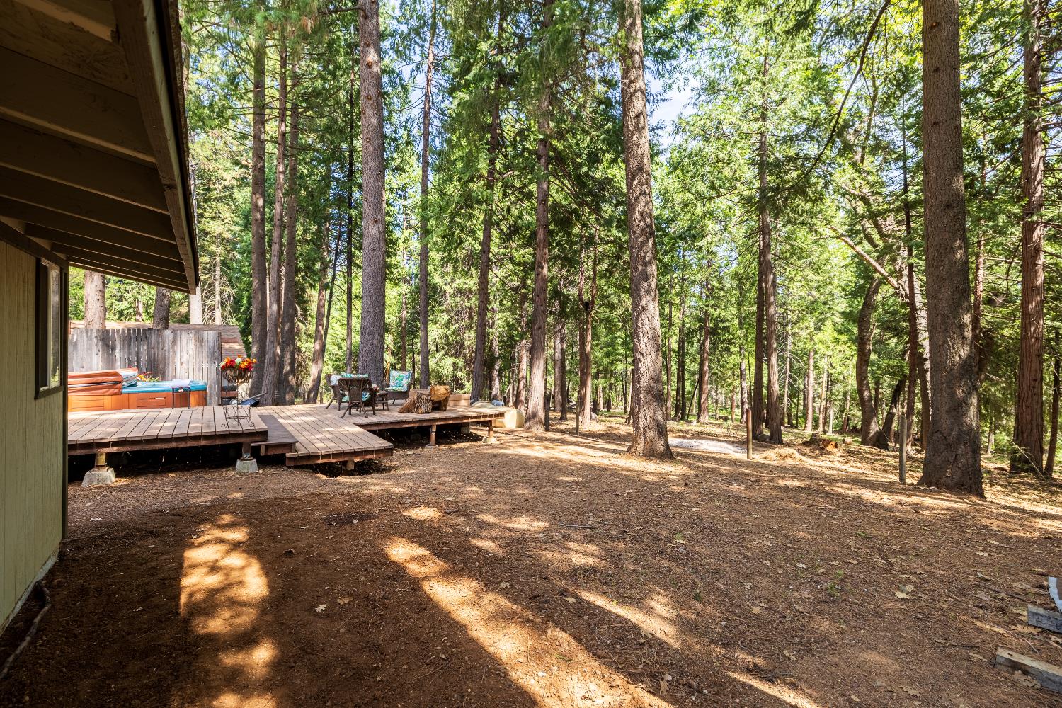 4838 Golden Street Pollock Pines, CA 95726 - Photo 26 of 35 a view of a street with a bench and trees