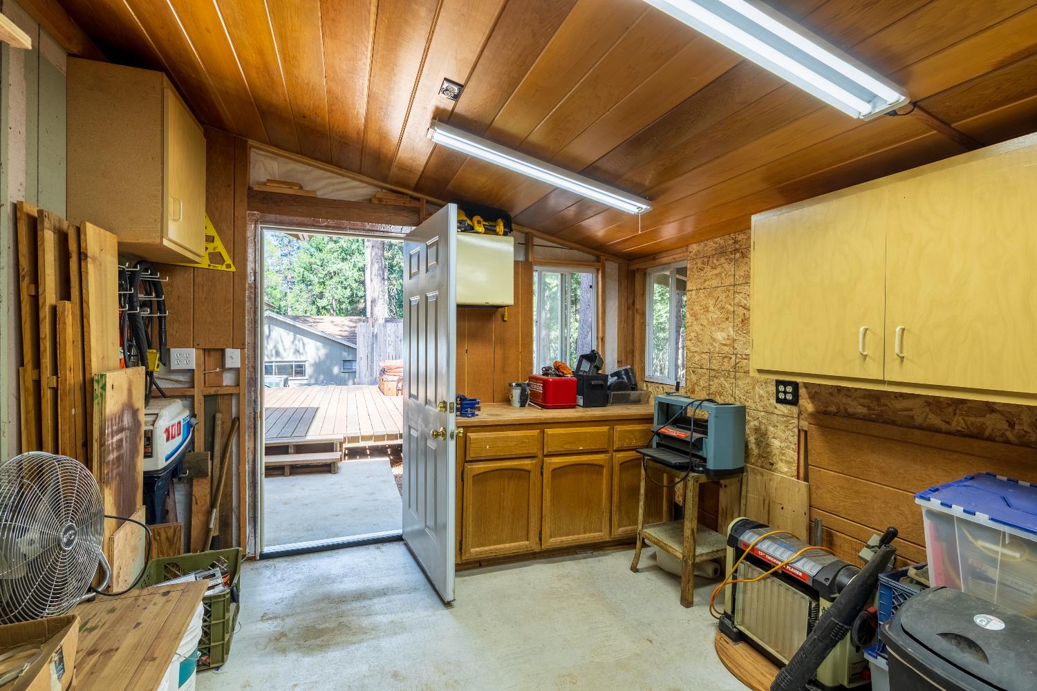 4838 Golden Street Pollock Pines, CA 95726 - Photo 29 of 35 a view of a workspace with furniture and a window
