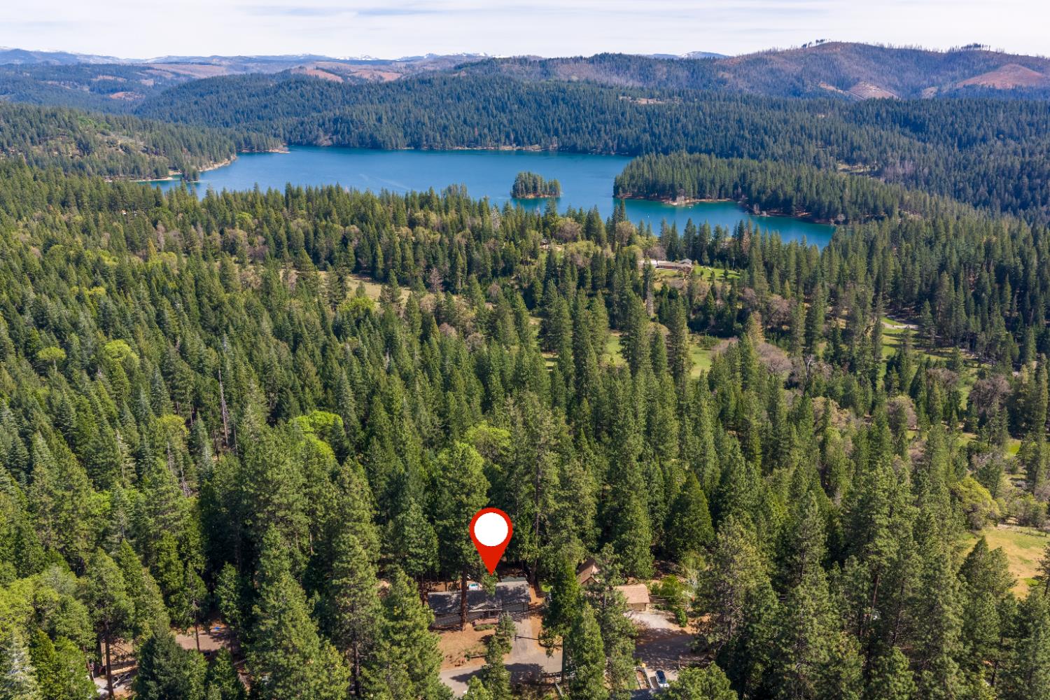 4838 Golden Street Pollock Pines, CA 95726 - Photo 3 of 35 a view of a lush green field and mountains