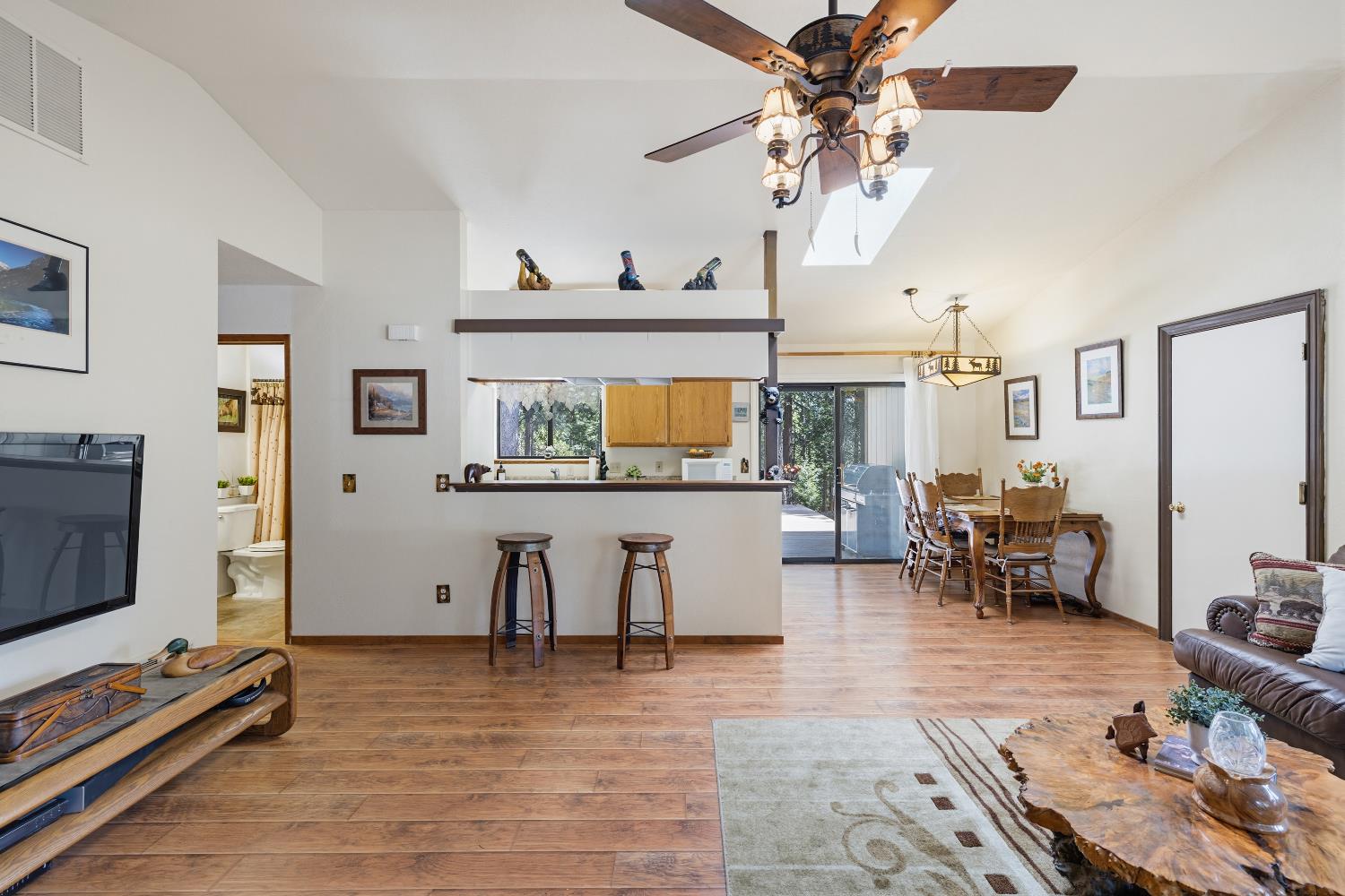 4838 Golden Street Pollock Pines, CA 95726 - Photo 5 of 35 a living room with furniture and a flat screen tv