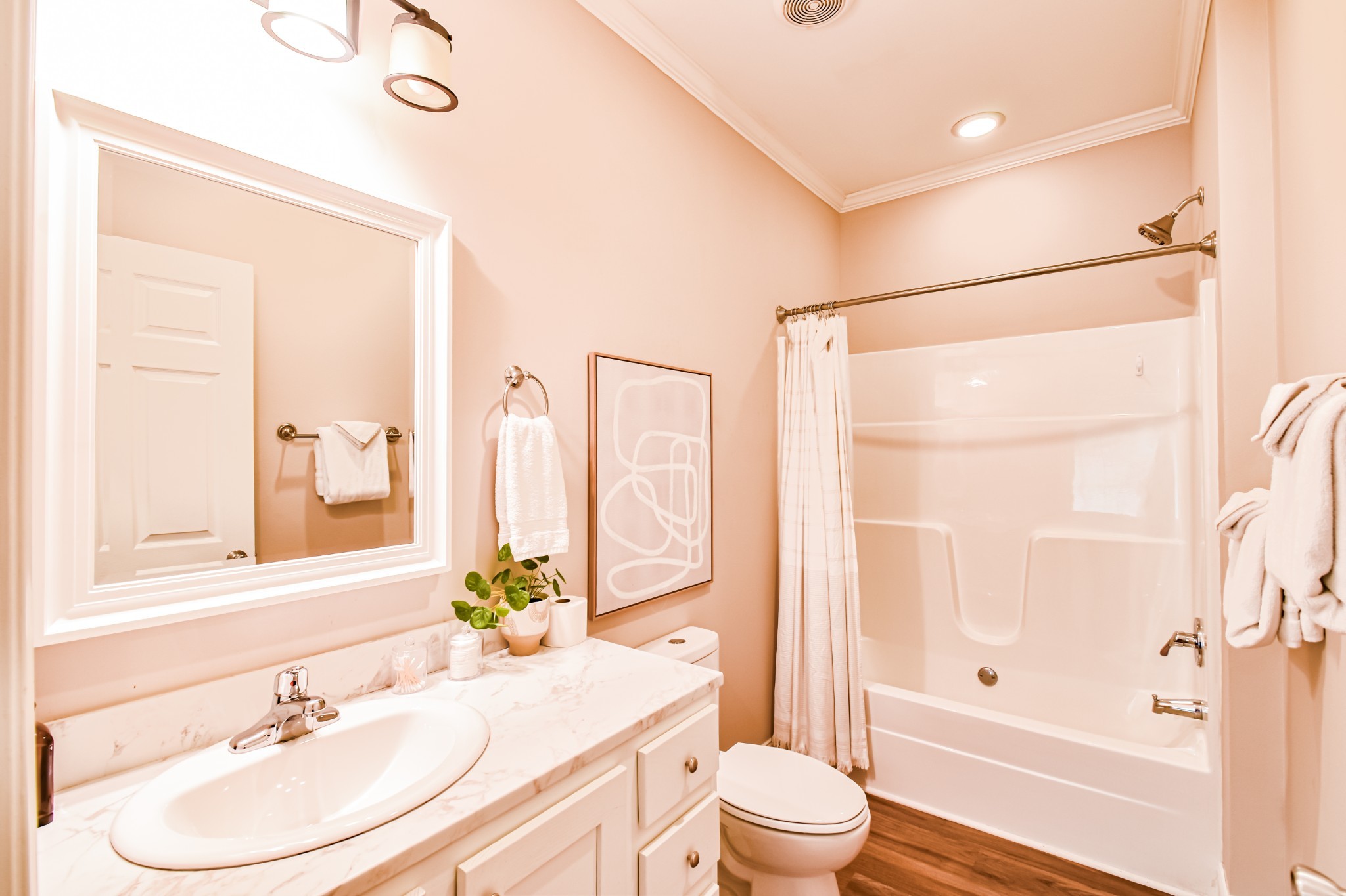 920 Mason Bates Bend Road Centerville, TN 37033 - Photo 24 of 44 a bathroom with a sink toilet and shower