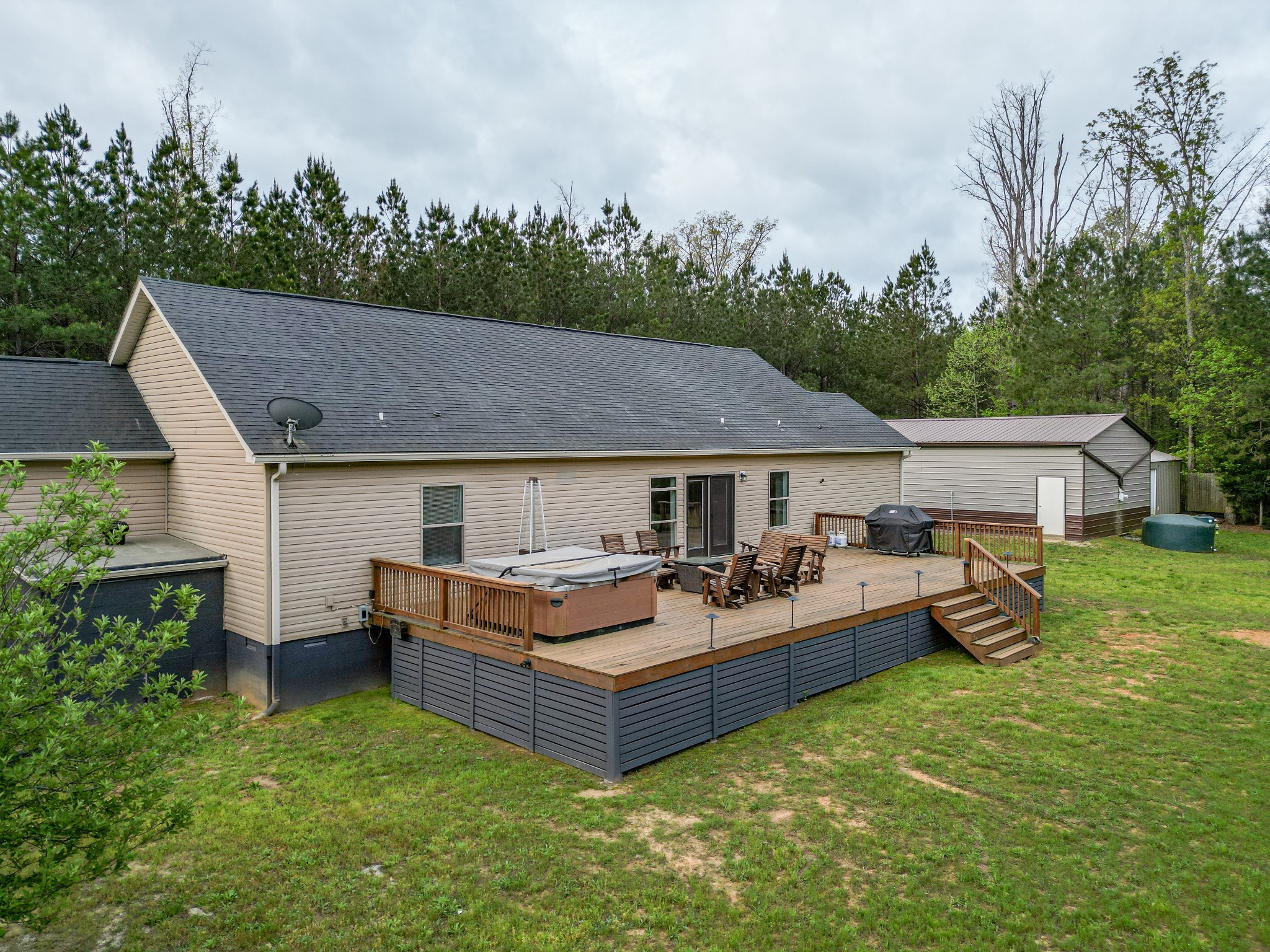 920 Mason Bates Bend Road Centerville, TN 37033 - Photo 8 of 44 a view of a house with backyard and sitting area