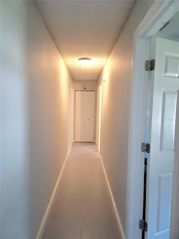 a bathroom with a toilet a sink and a mirror