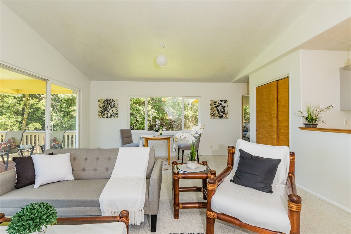 455 Akolea Road Hilo, HI 96720 - Photo 12 of 29 a living room with furniture and a large window
