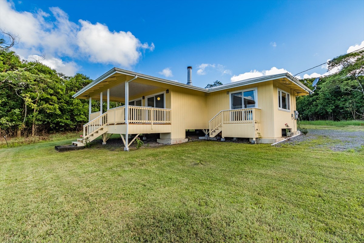 455 Akolea Road Hilo, HI 96720 - Photo 7 of 29 a front view of a house with garden