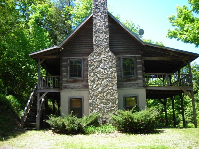 a front view of house with yard