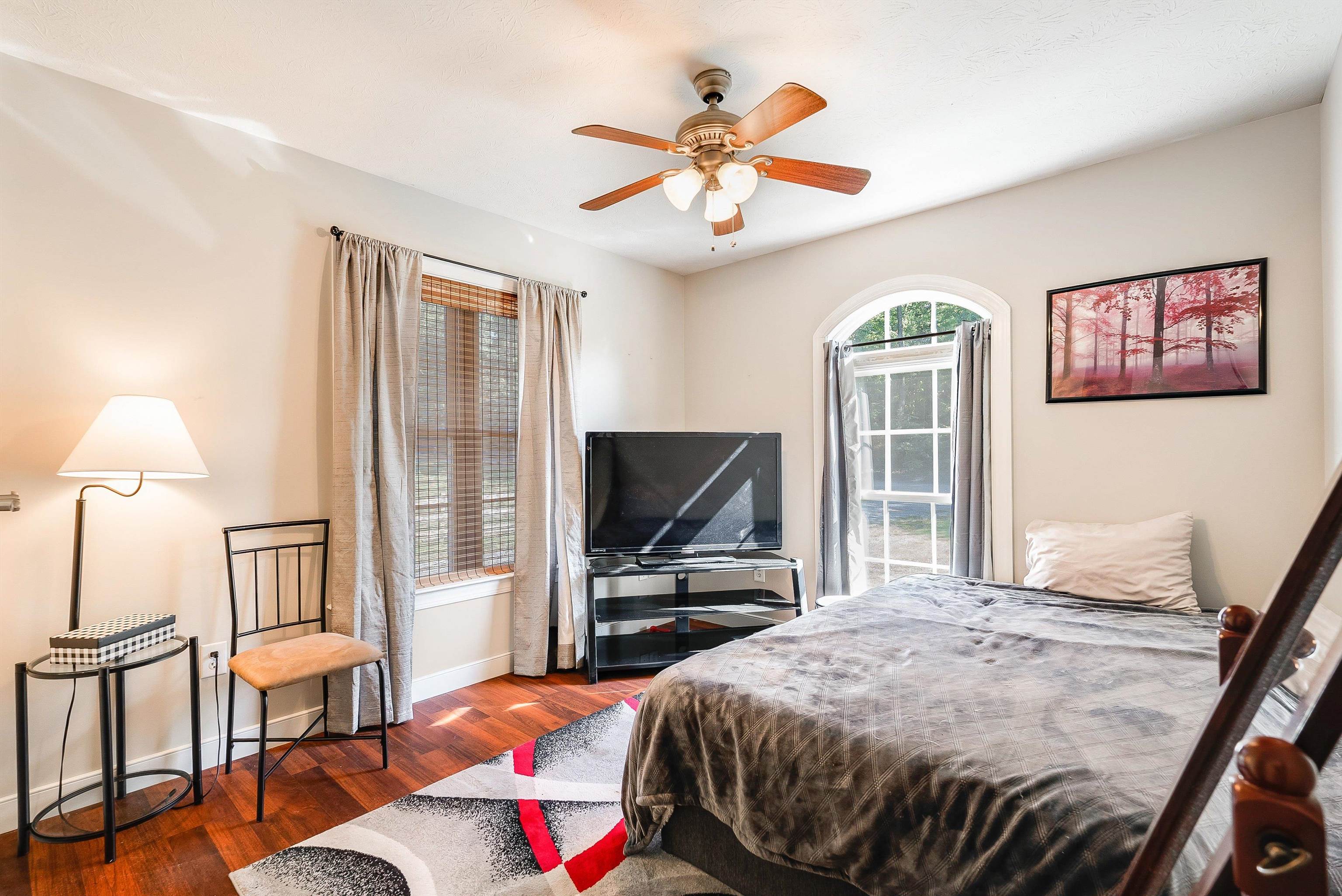 468 Paine Run Road Grottoes, VA 24441 - Photo 24 of 31 a bedroom with a bed and a flat screen tv