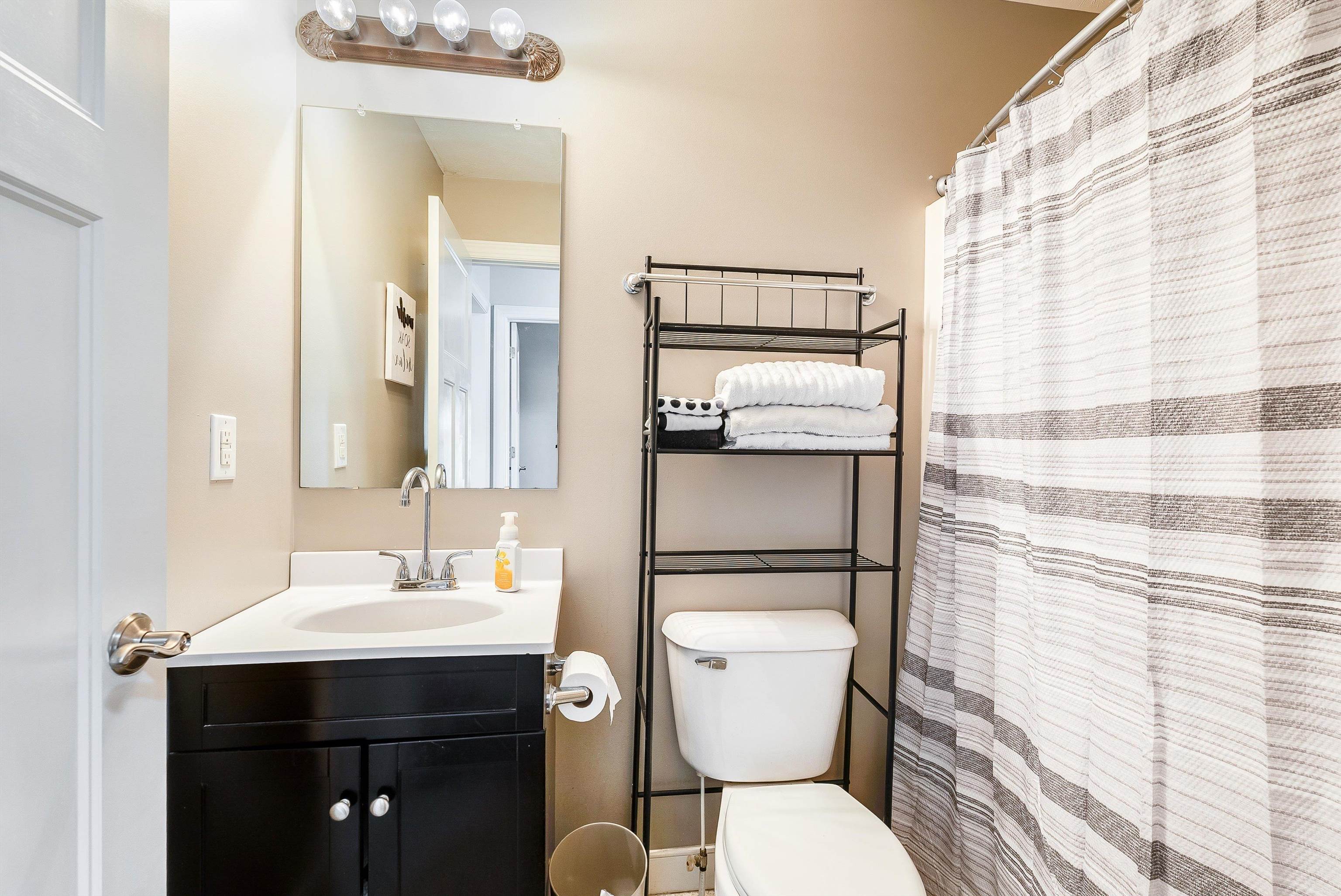 468 Paine Run Road Grottoes, VA 24441 - Photo 26 of 31 a bathroom with a sink toilet and shower