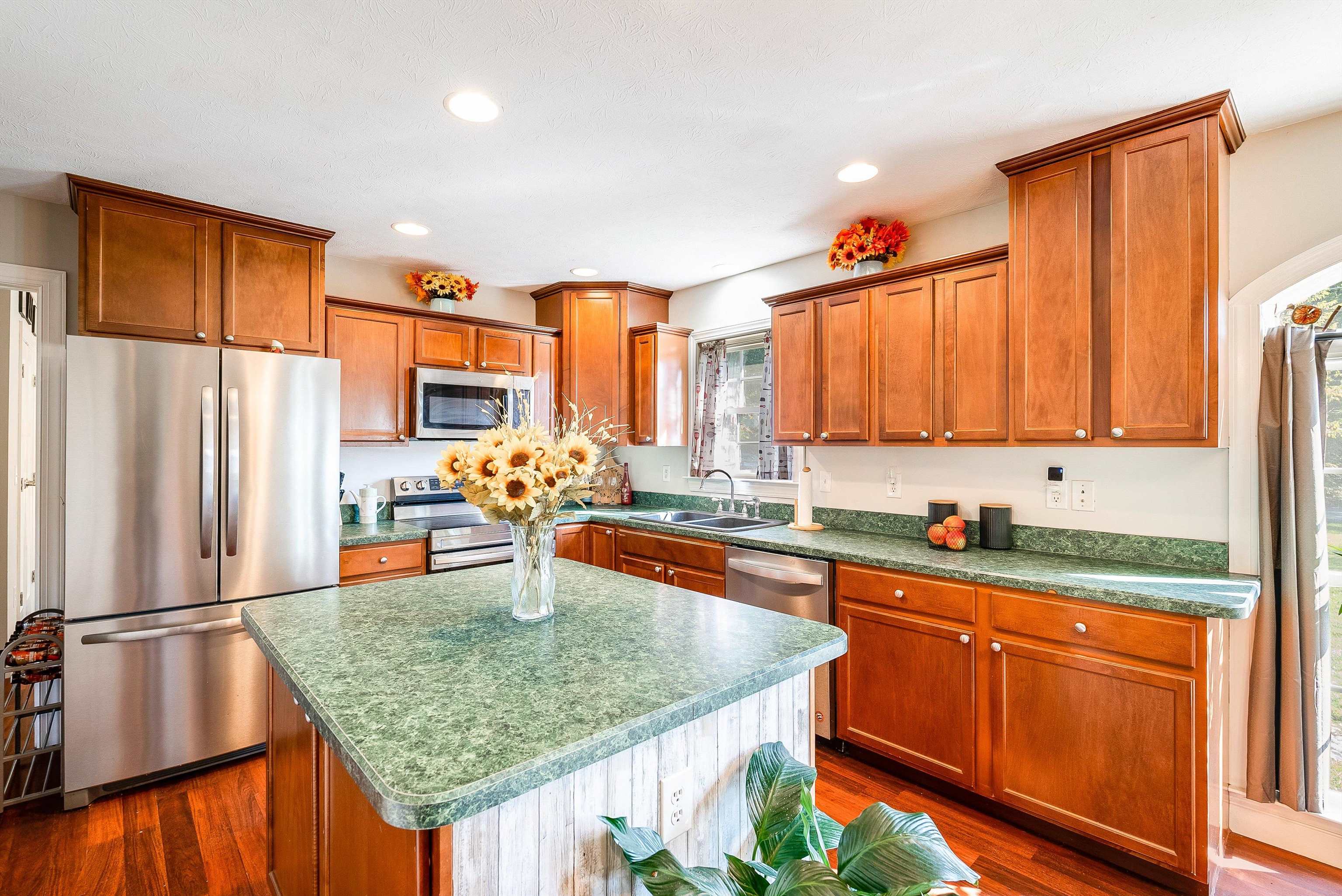 468 Paine Run Road Grottoes, VA 24441 - Photo 9 of 31 a kitchen with stainless steel appliances granite countertop a sink counter space and a refrigerator