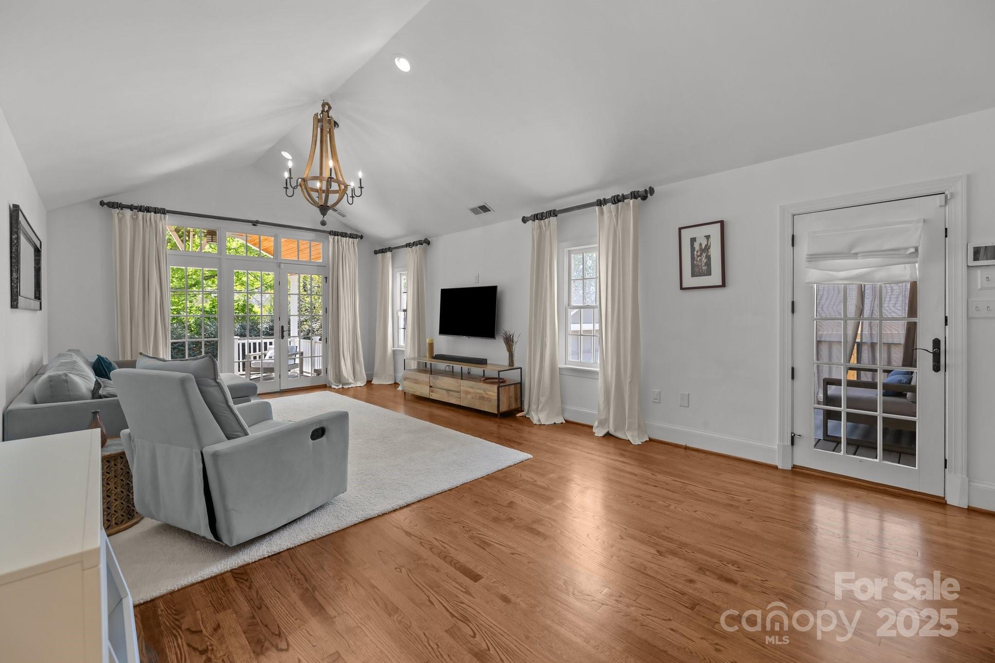 3019 Sunset Drive Charlotte, NC 28209 - Photo 11 of 46 a living room with furniture and a flat screen tv