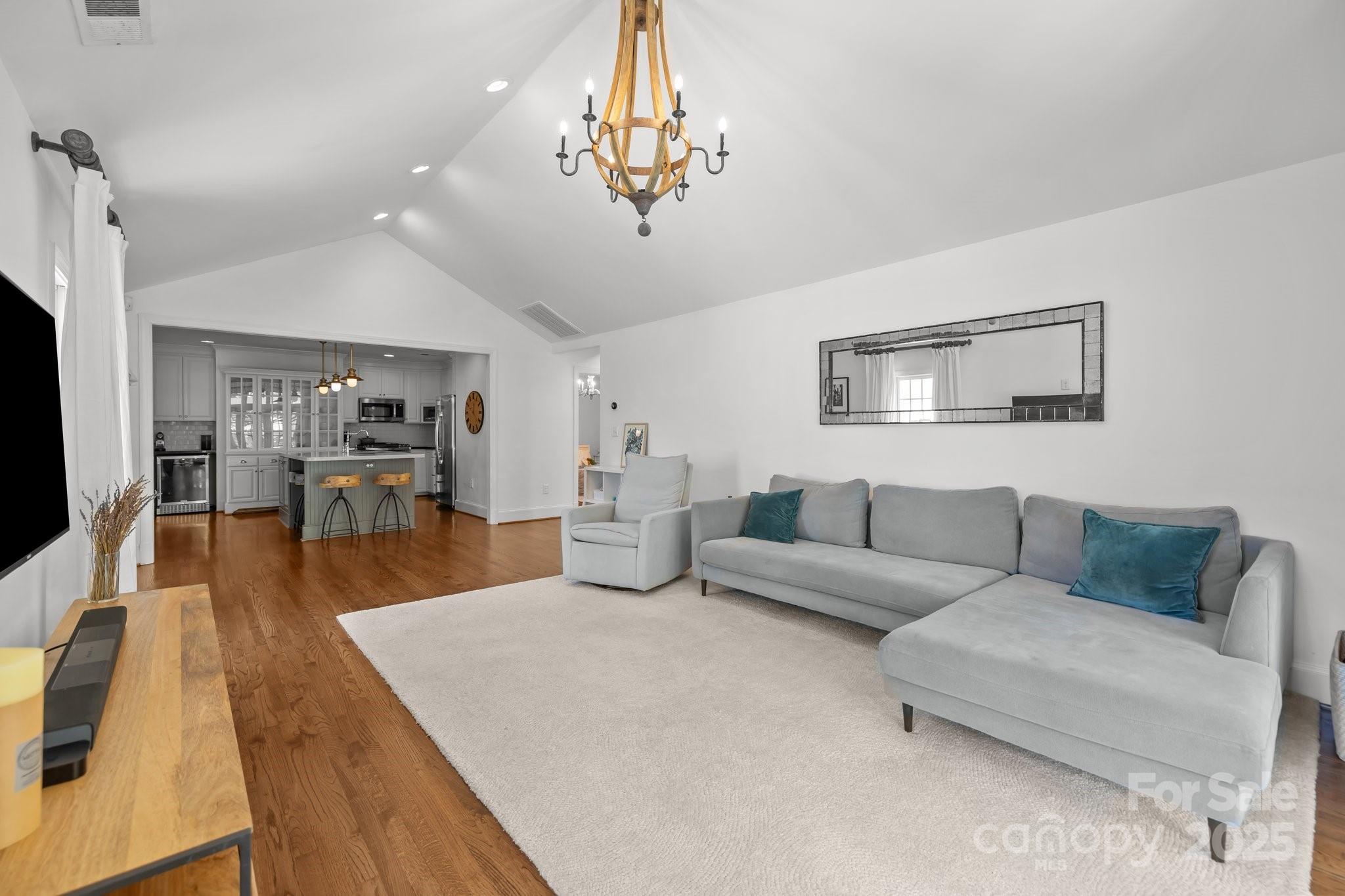 3019 Sunset Drive Charlotte, NC 28209 - Photo 12 of 46 a living room with furniture and a chandelier