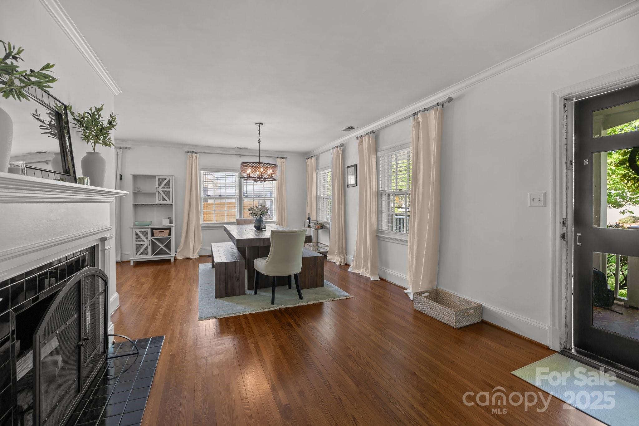 3019 Sunset Drive Charlotte, NC 28209 - Photo 23 of 46 a living room with fireplace furniture and a wooden floor