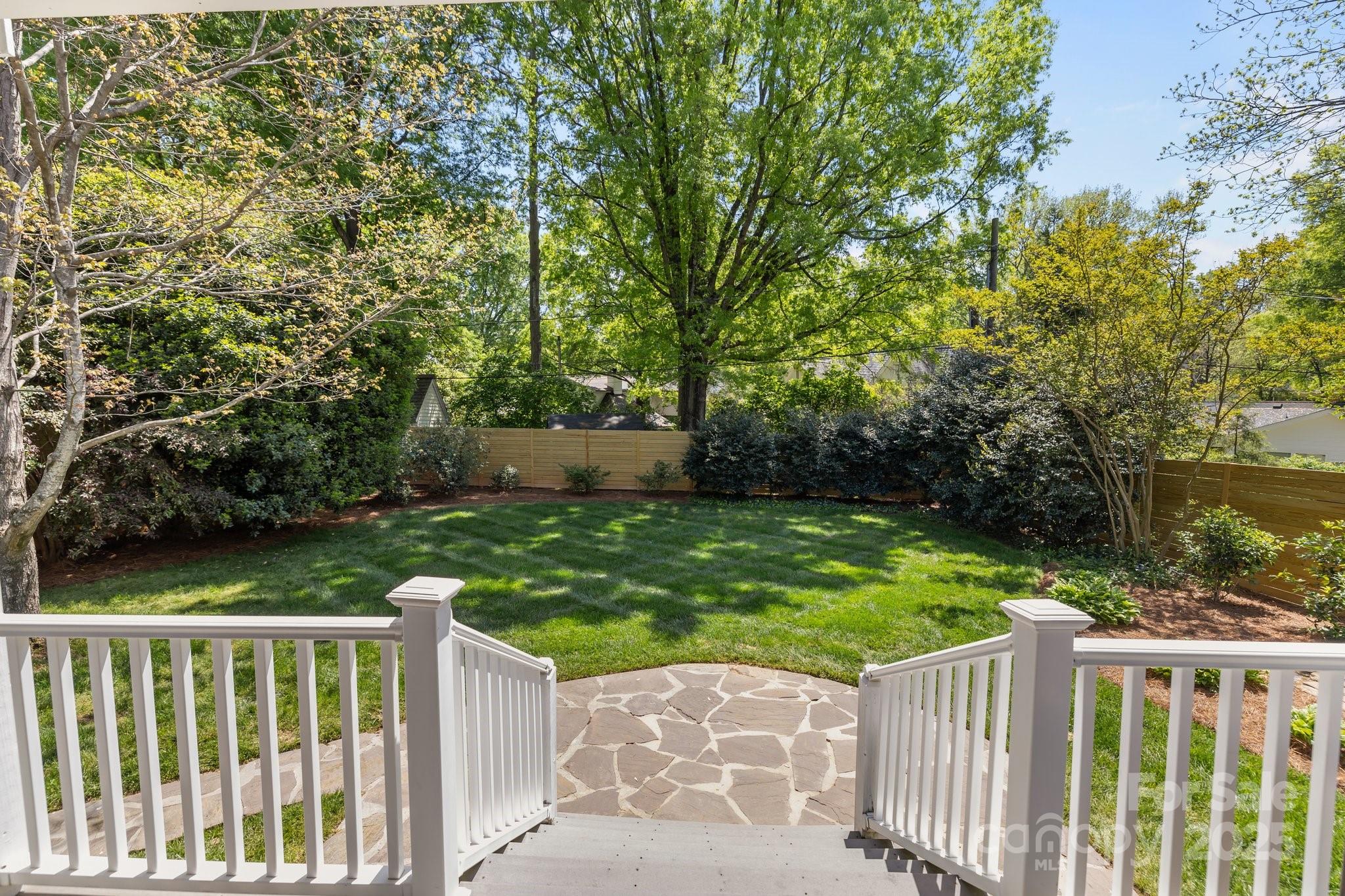 3019 Sunset Drive Charlotte, NC 28209 - Photo 32 of 46 a view of deck with wooden fence and trees