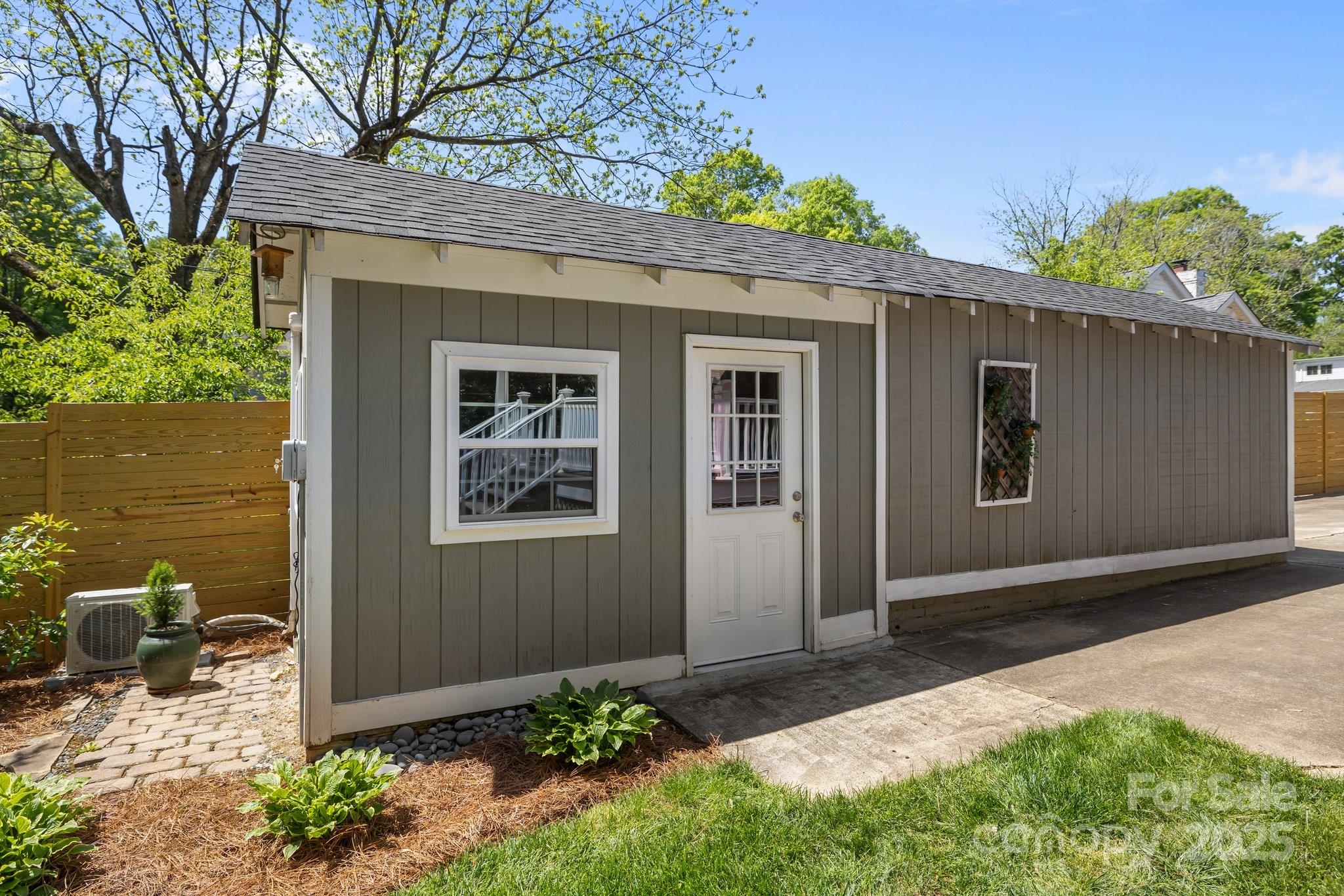 3019 Sunset Drive Charlotte, NC 28209 - Photo 33 of 46 a front view of a house with garden