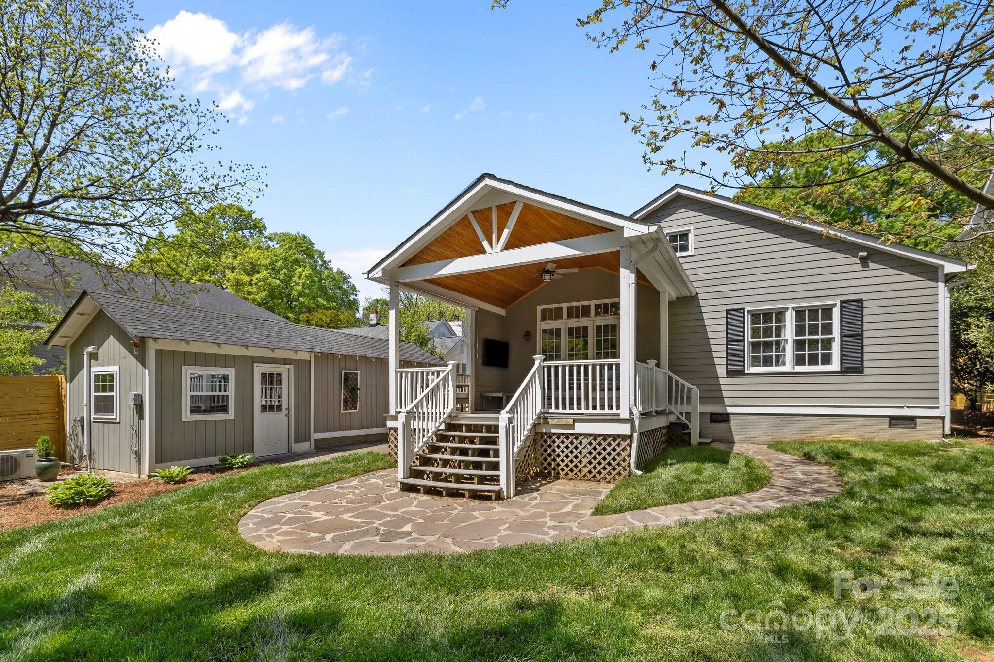 3019 Sunset Drive Charlotte, NC 28209 - Photo 34 of 46 a front view of a house with a yard