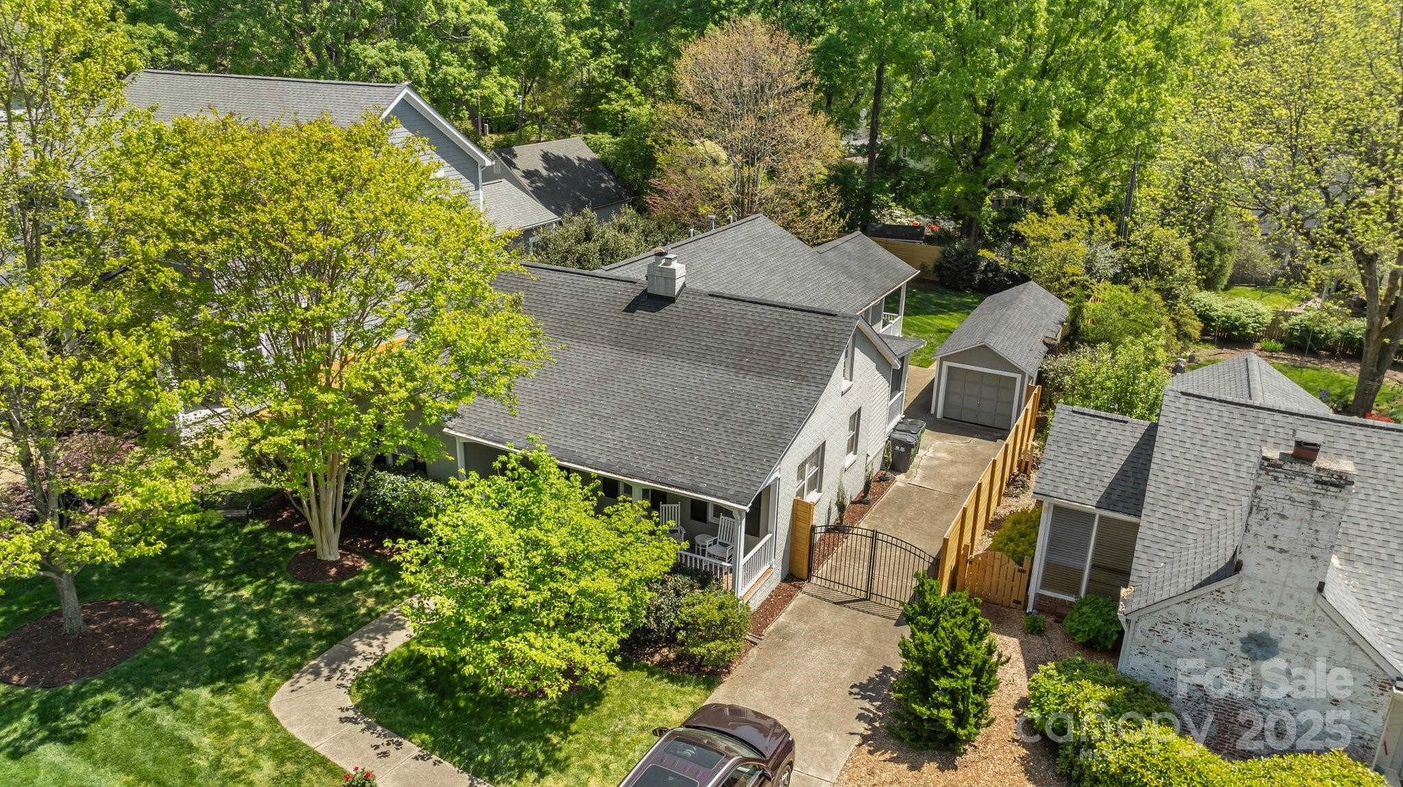 3019 Sunset Drive Charlotte, NC 28209 - Photo 43 of 46 an aerial view of a house with a yard basket ball court and outdoor seating