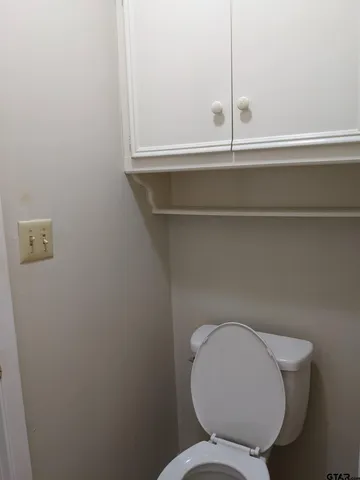 a bathroom with a toilet