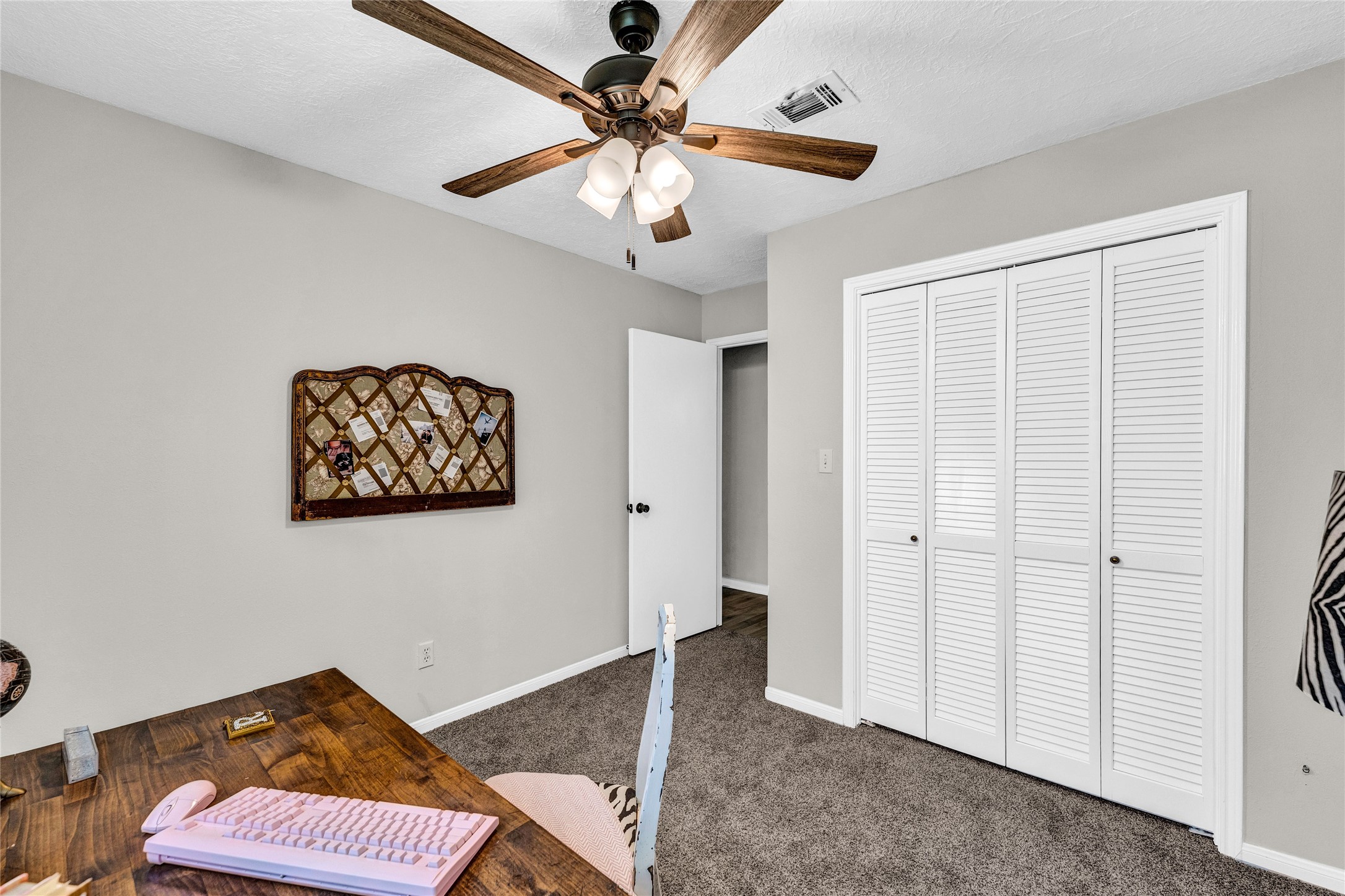 2705 Parrott Avenue Rosenberg, TX 77471 - Photo 23 of 27 a view of a hallway with a workspace