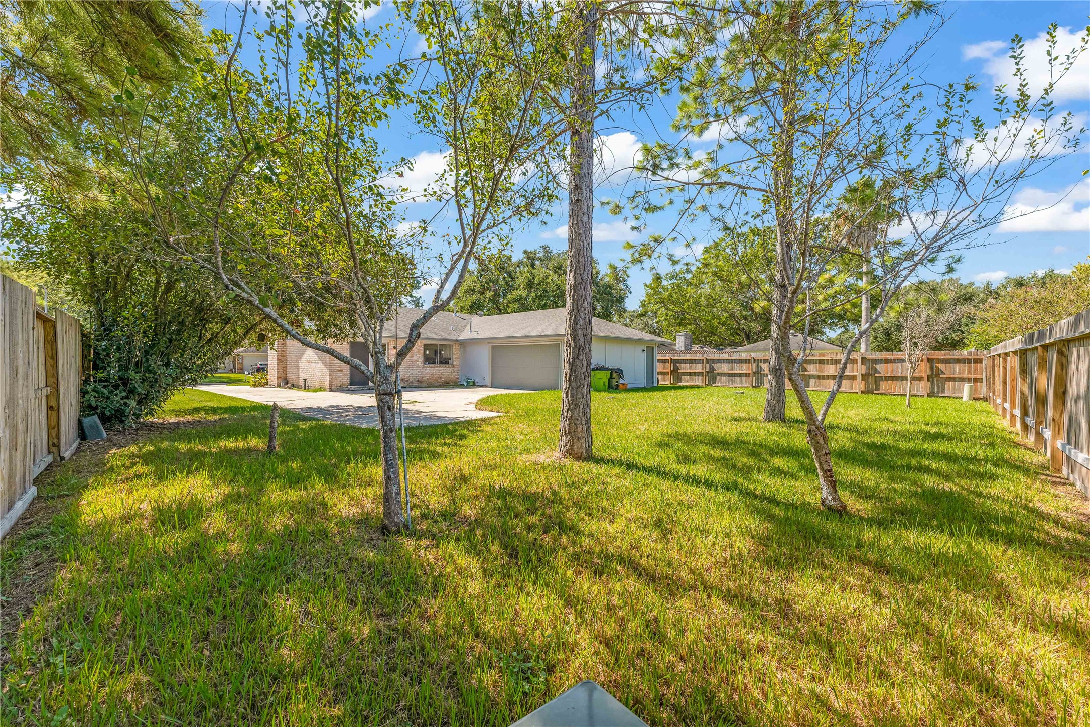 2705 Parrott Avenue Rosenberg, TX 77471 - Photo 25 of 27 a view of a yard with swimming pool