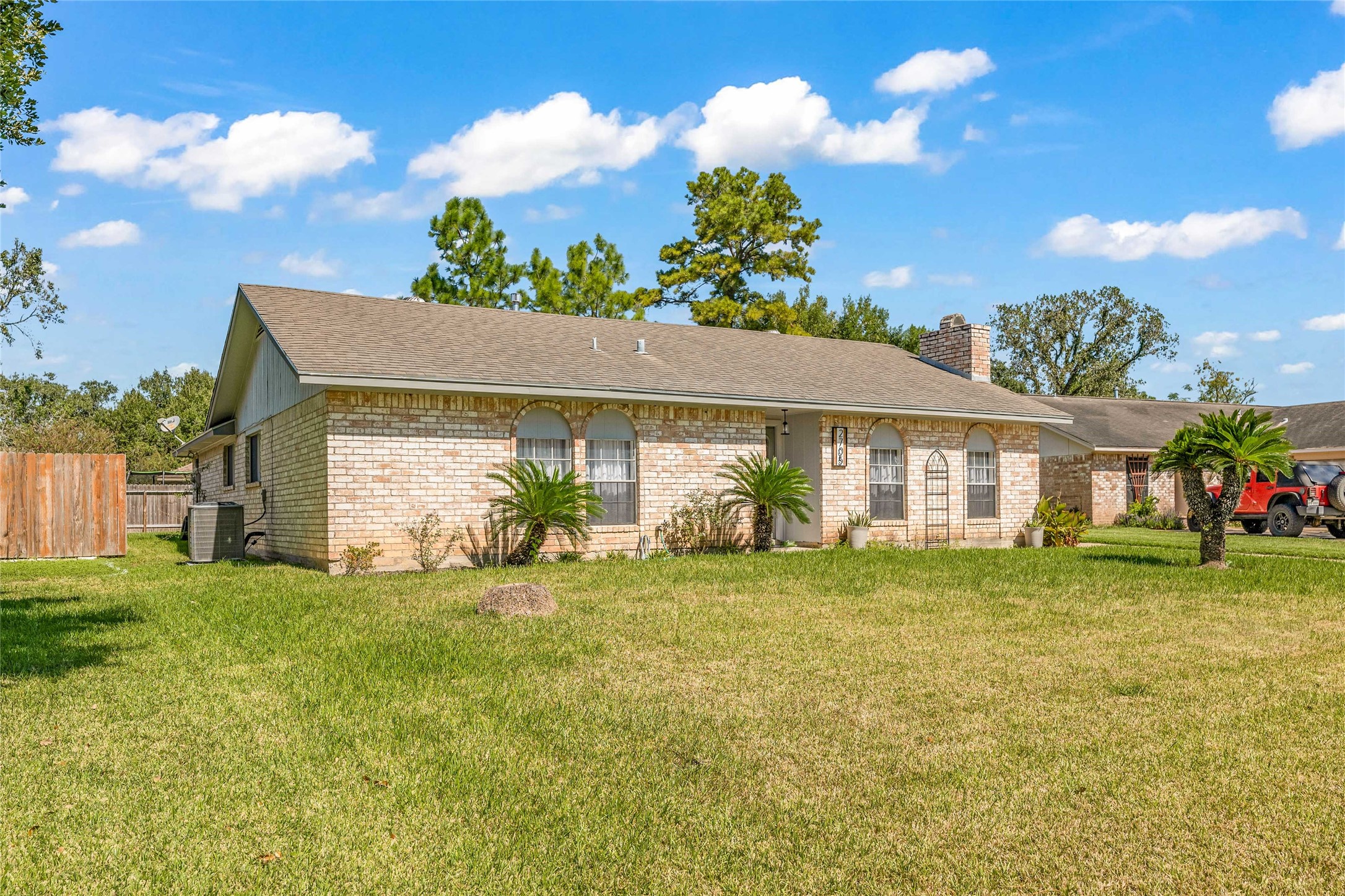 2705 Parrott Avenue Rosenberg, TX 77471 - Photo 4 of 27 a view of a house with a yard