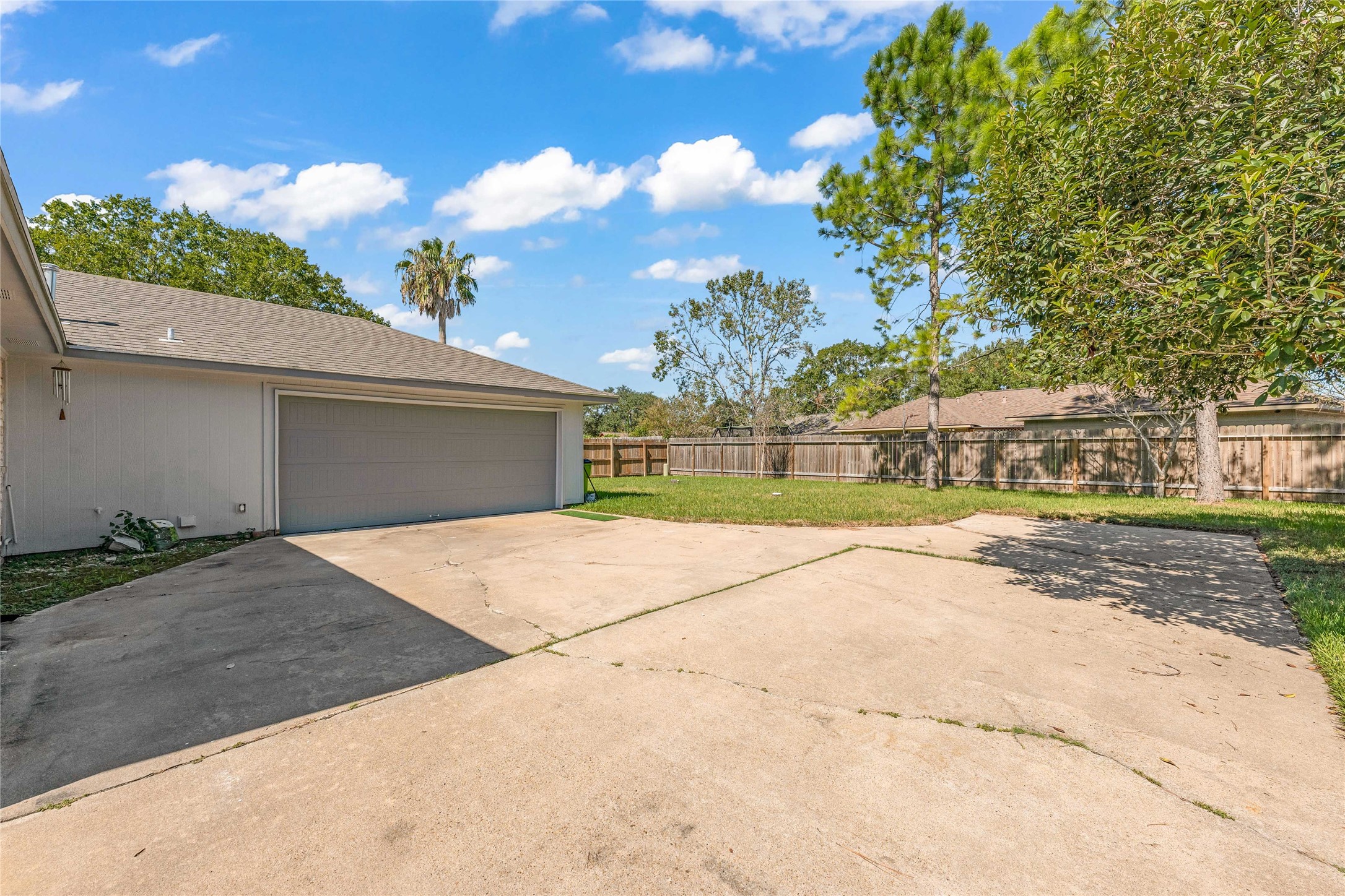 2705 Parrott Avenue Rosenberg, TX 77471 - Photo 5 of 27 a view of a house with a yard and garage