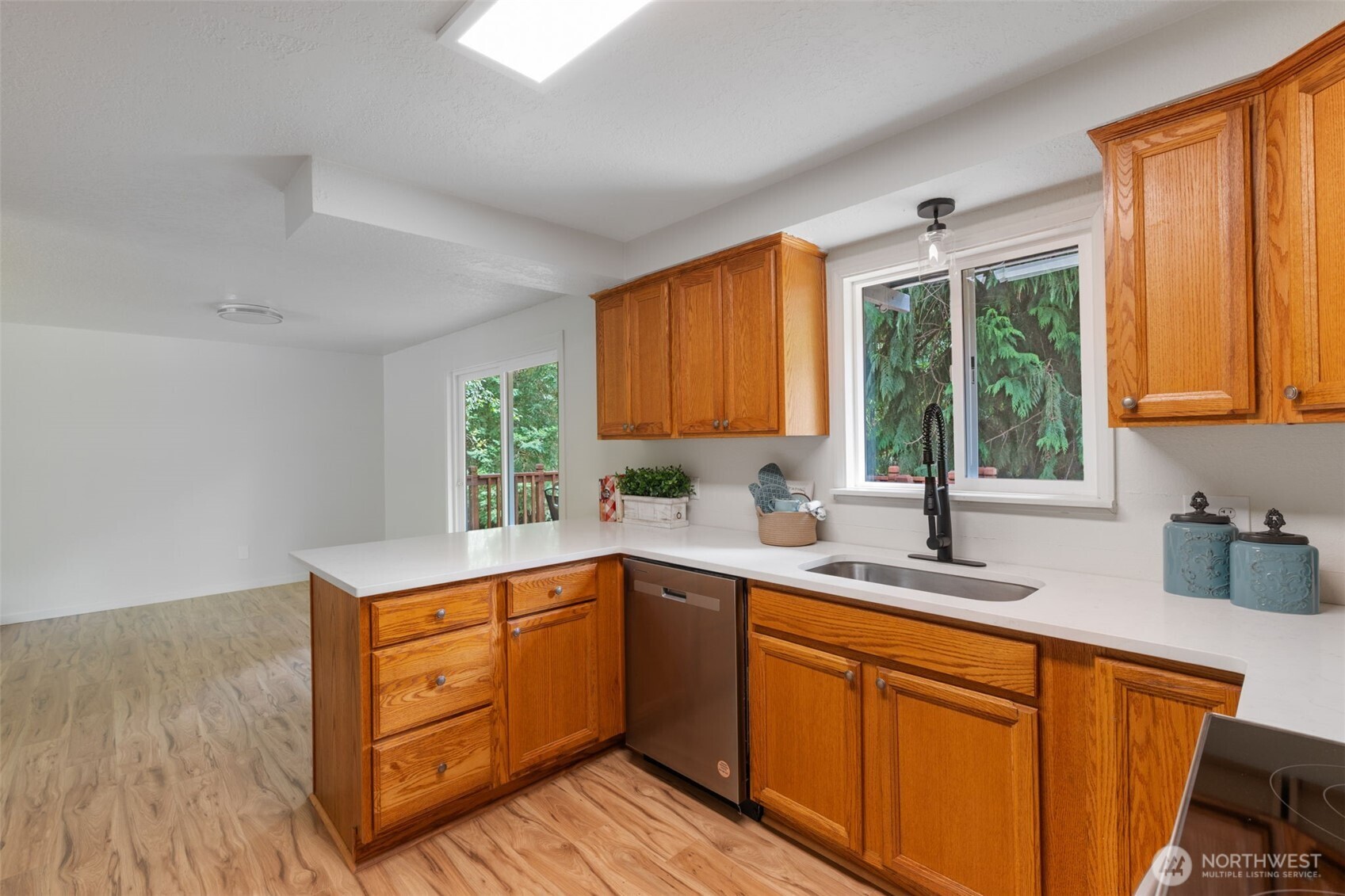 115 Maschke Road Vader, WA 98593 - Photo 15 of 40 a kitchen with a sink stove and cabinets