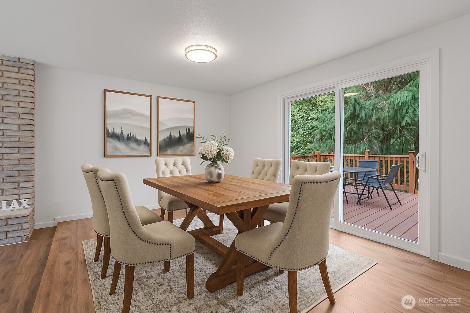 115 Maschke Road Vader, WA 98593 - Photo 18 of 40 a view of a dining room with furniture window and wooden floor