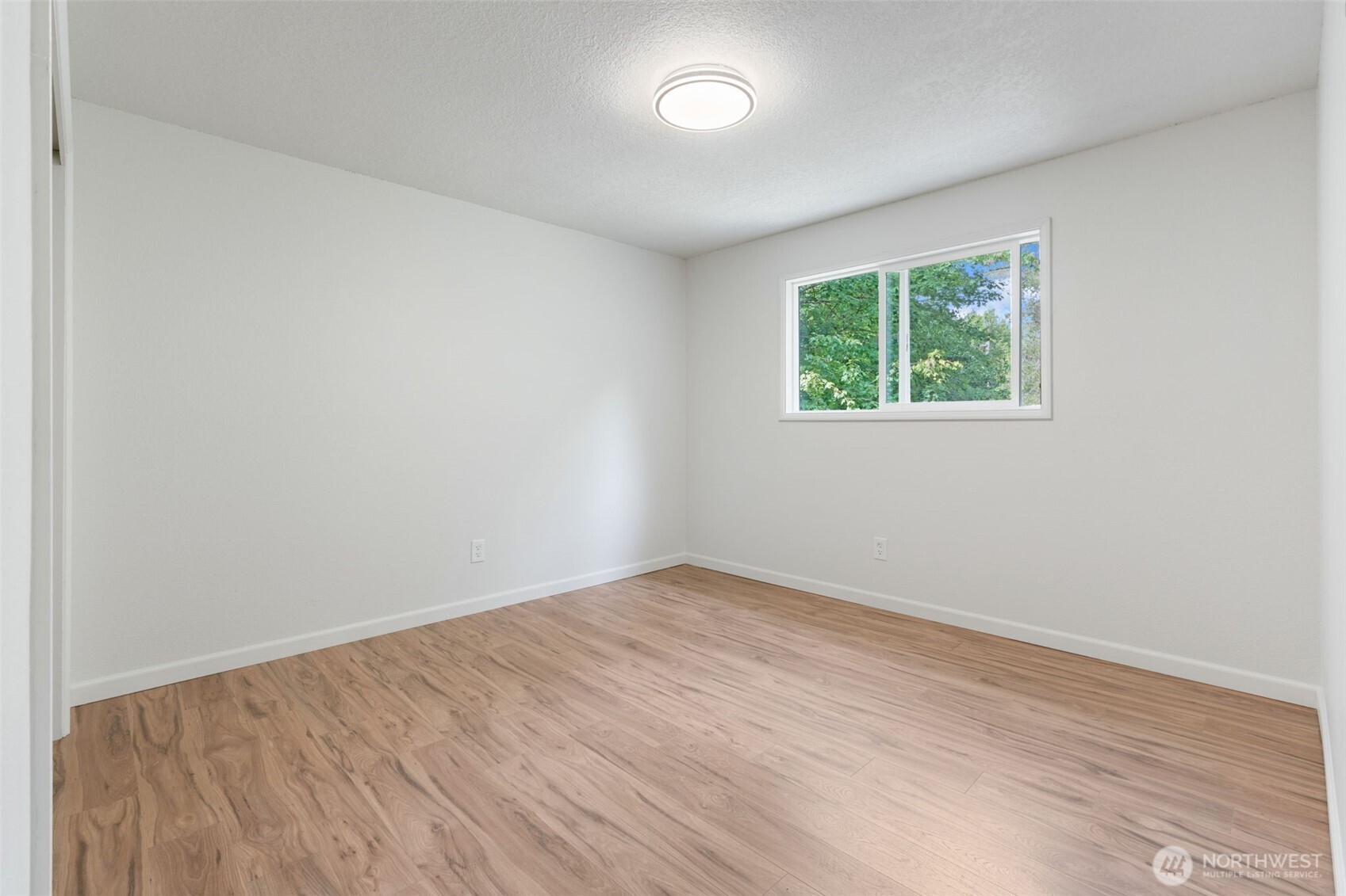 115 Maschke Road Vader, WA 98593 - Photo 21 of 40 an empty room with a window