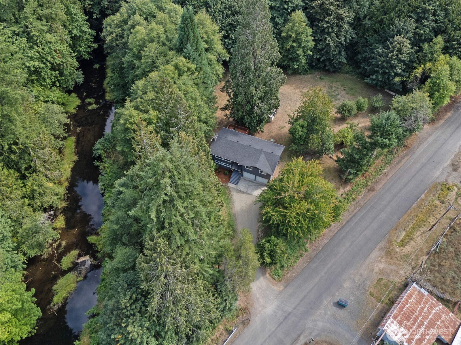 115 Maschke Road Vader, WA 98593 - Photo 39 of 40 an aerial view of a house with a yard