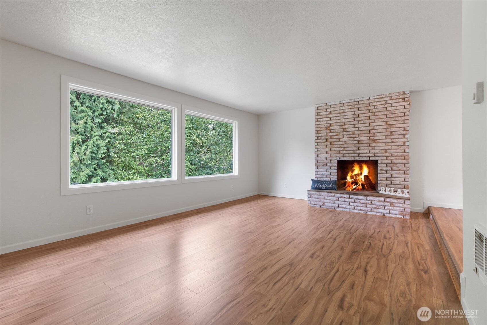 115 Maschke Road Vader, WA 98593 - Photo 7 of 40 wooden floor in an empty room with a window