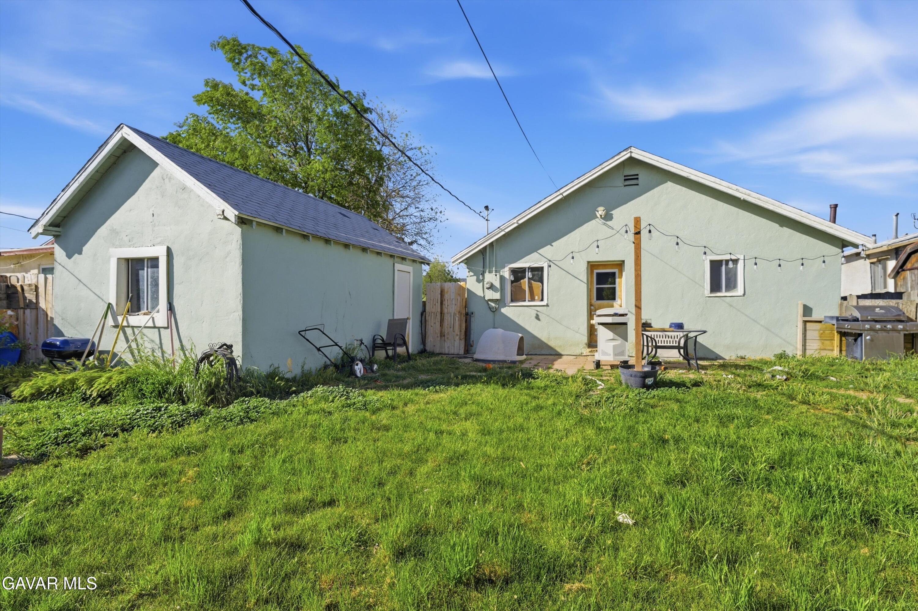 124 I Street East Tehachapi, CA 93561 - Photo 12 of 15 a view of a house with backyard