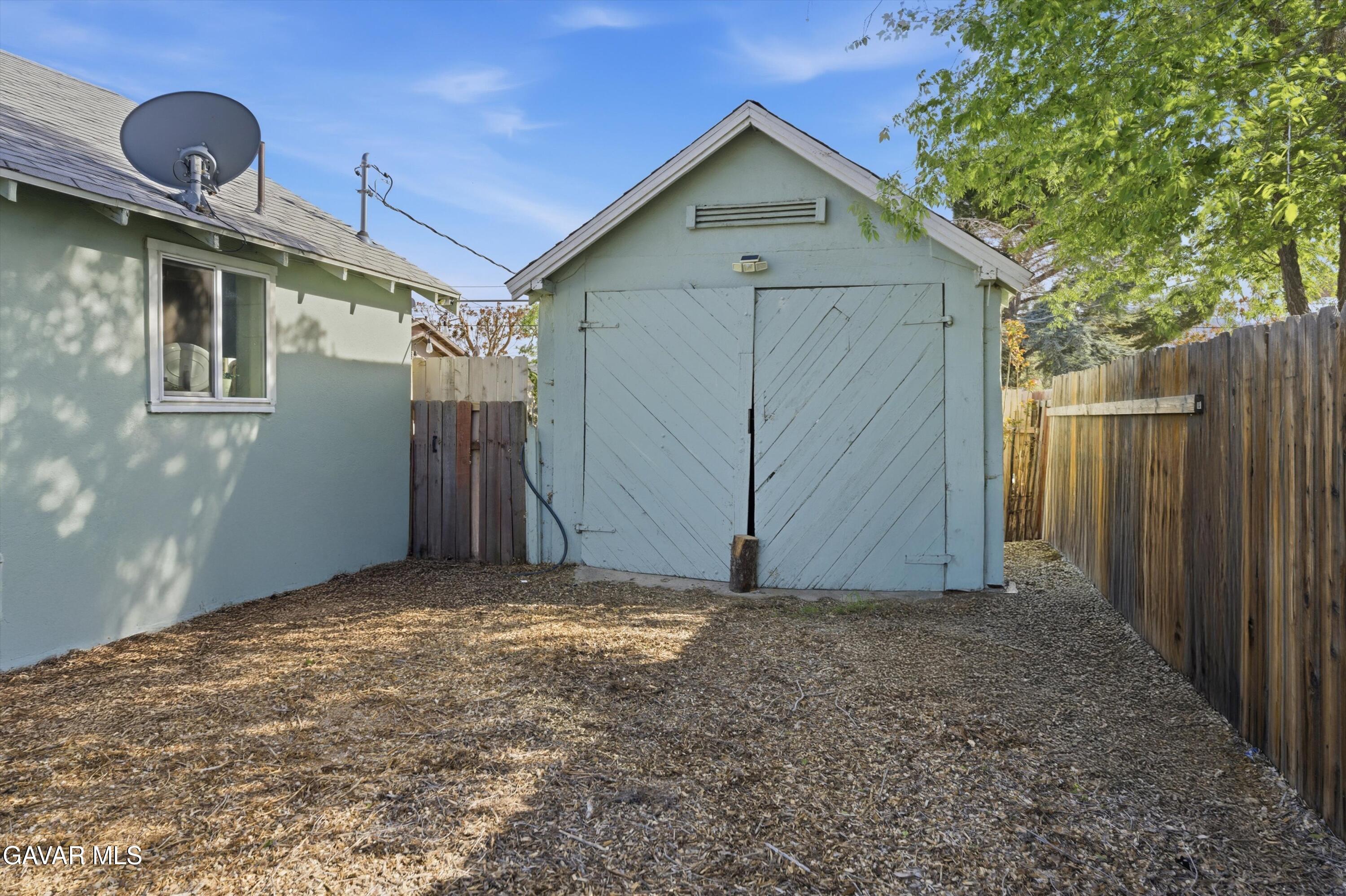 124 I Street East Tehachapi, CA 93561 - Photo 14 of 15 a view of a house with a yard