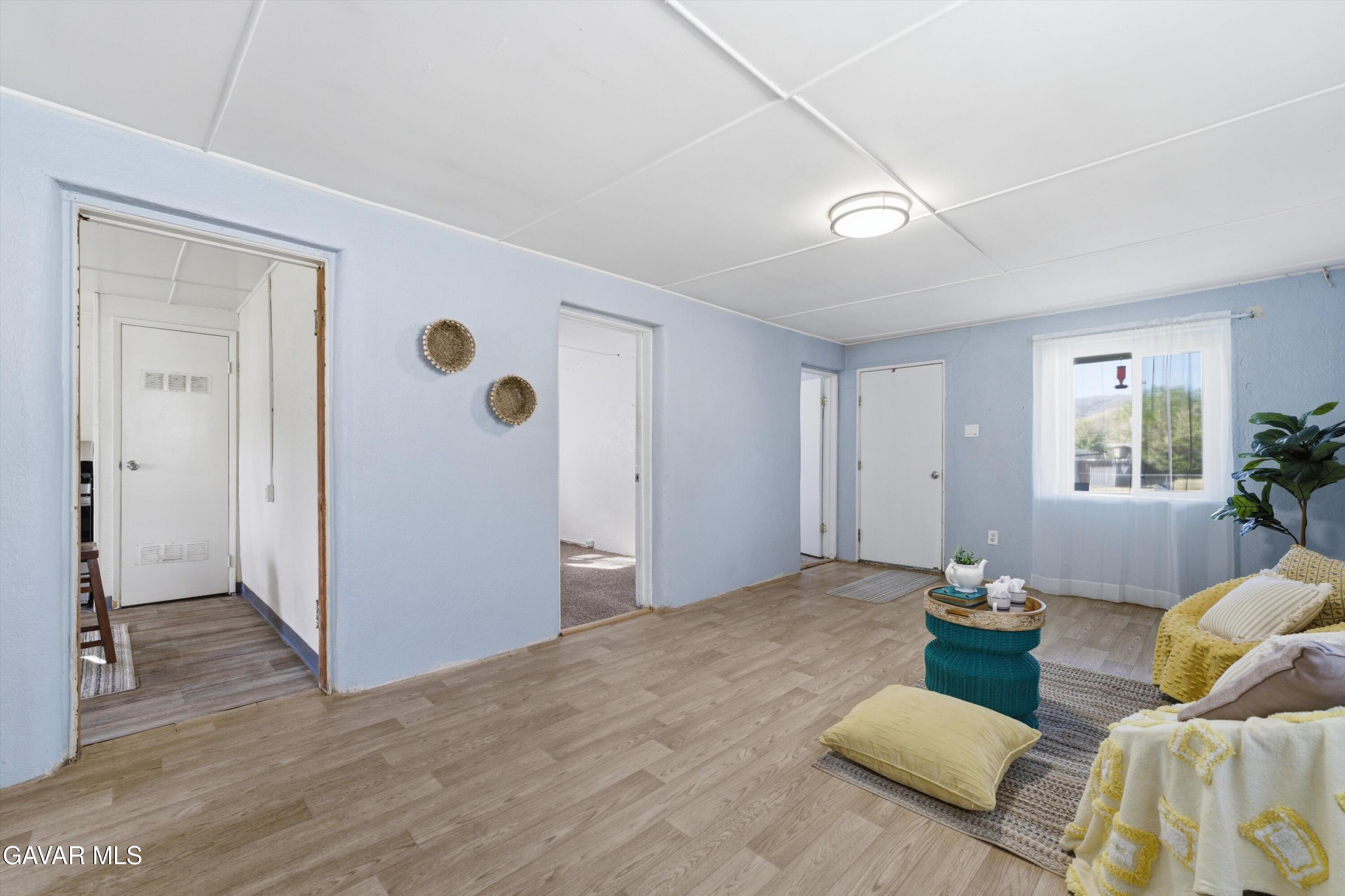 124 I Street East Tehachapi, CA 93561 - Photo 8 of 15 a living room with furniture and wooden floor