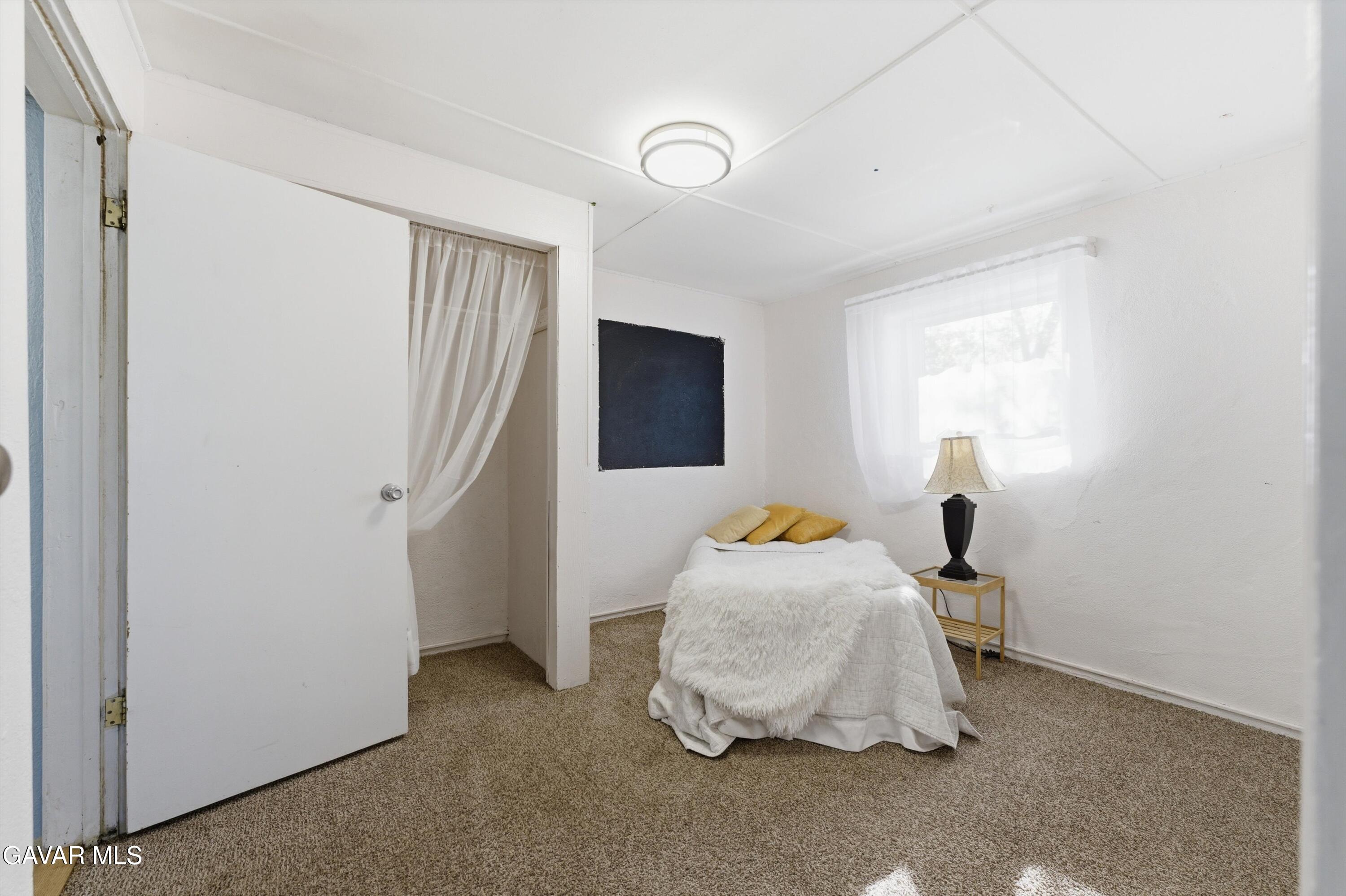 124 I Street East Tehachapi, CA 93561 - Photo 10 of 15 a room with storage and utility