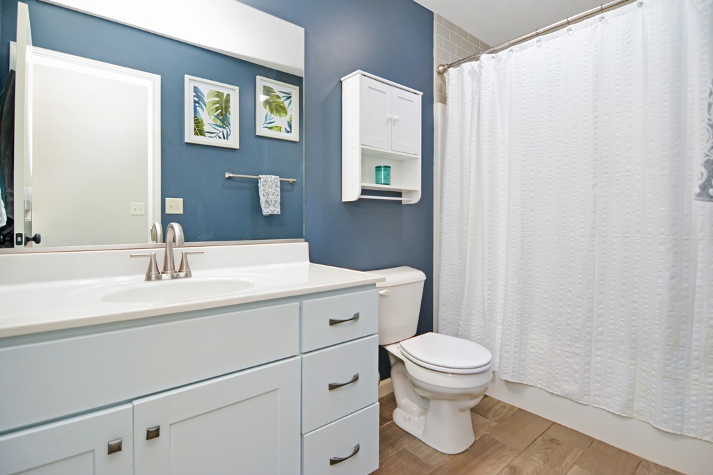 1711 Flagstone Drive Normal, IL 61761 - Photo 37 of 65 a bathroom with a sink a toilet and a mirror