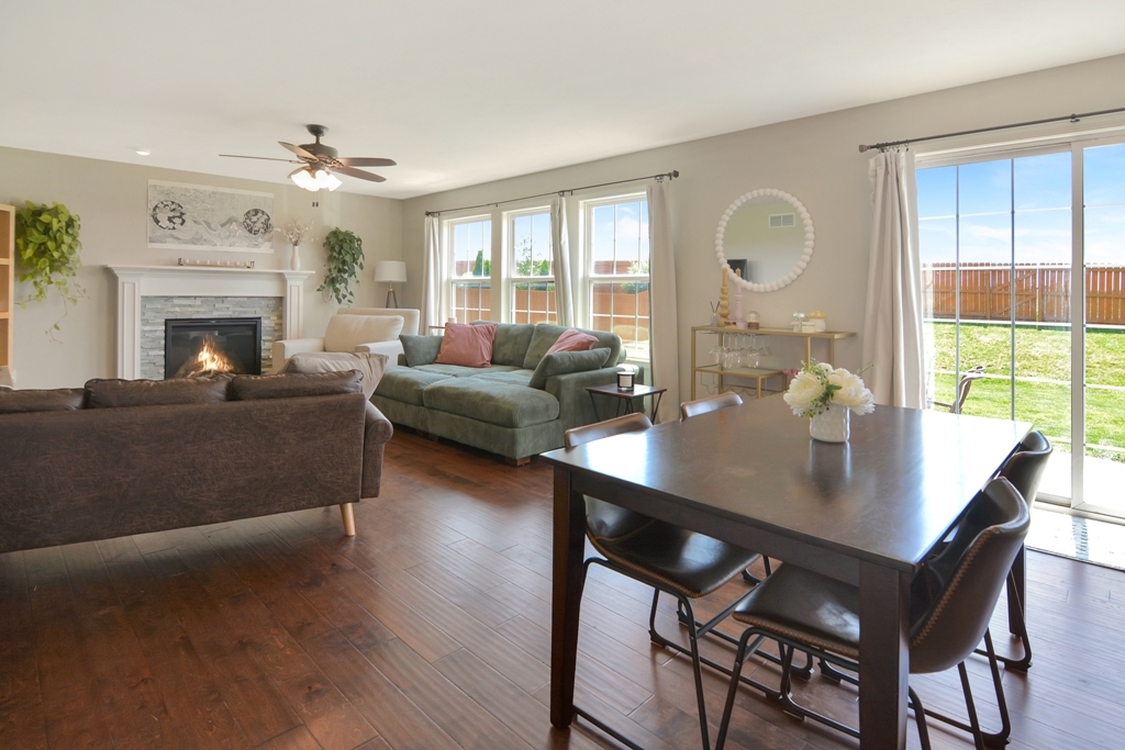1711 Flagstone Drive Normal, IL 61761 - Photo 48 of 65 a living room with fireplace furniture and a large window