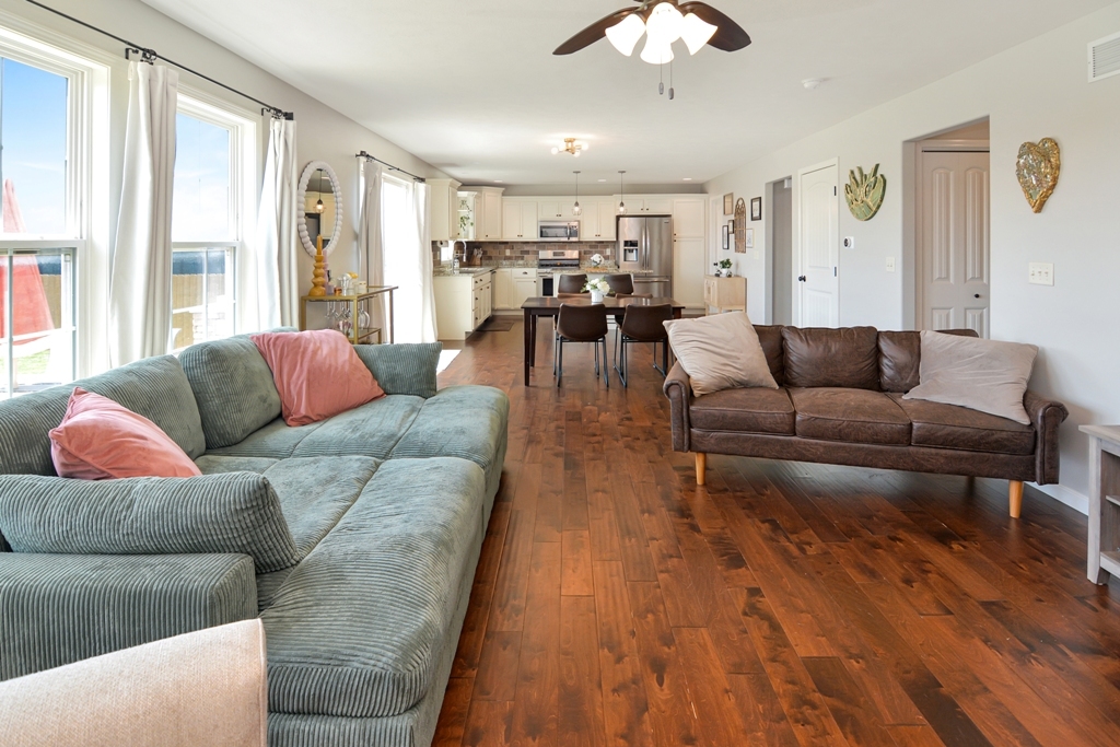 1711 Flagstone Drive Normal, IL 61761 - Photo 52 of 65 a living room with furniture and a large window